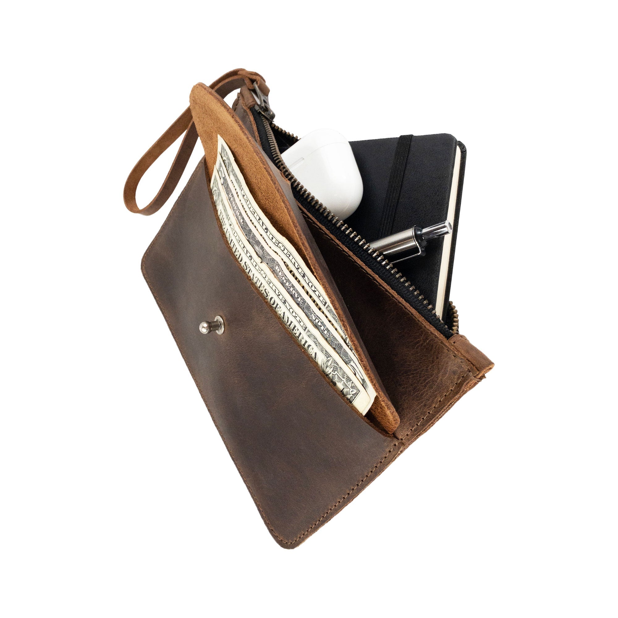 Stylish side view of Heather's Clutch Bag with Extra Pouch, showcasing its elegant design in Full Grain Leather. This wrist wallet for cards combines artisanal craftsmanship with functionality, handmade in La Antigua Guatemala & Oaxaca Mexico.