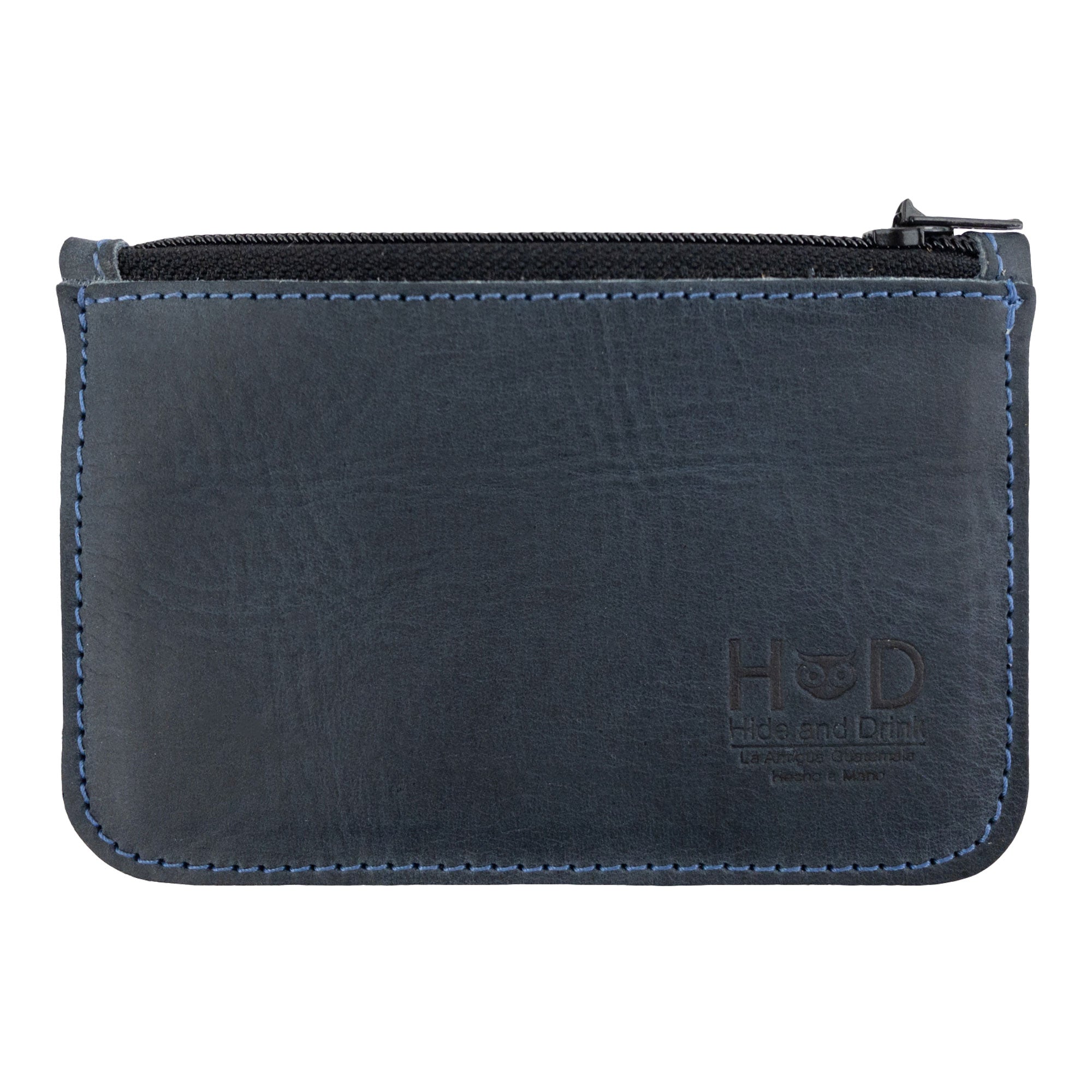 Hide & Drink Zippered Wallet, showcasing a stylish Full Grain Leather design. This card case features a zip closure ideal for organizing folded bills and coins. A perfect travel accessory, hand cut and sewn, with a fire branded logo, made in La Antigua Guatemala & Oaxaca Mexico.