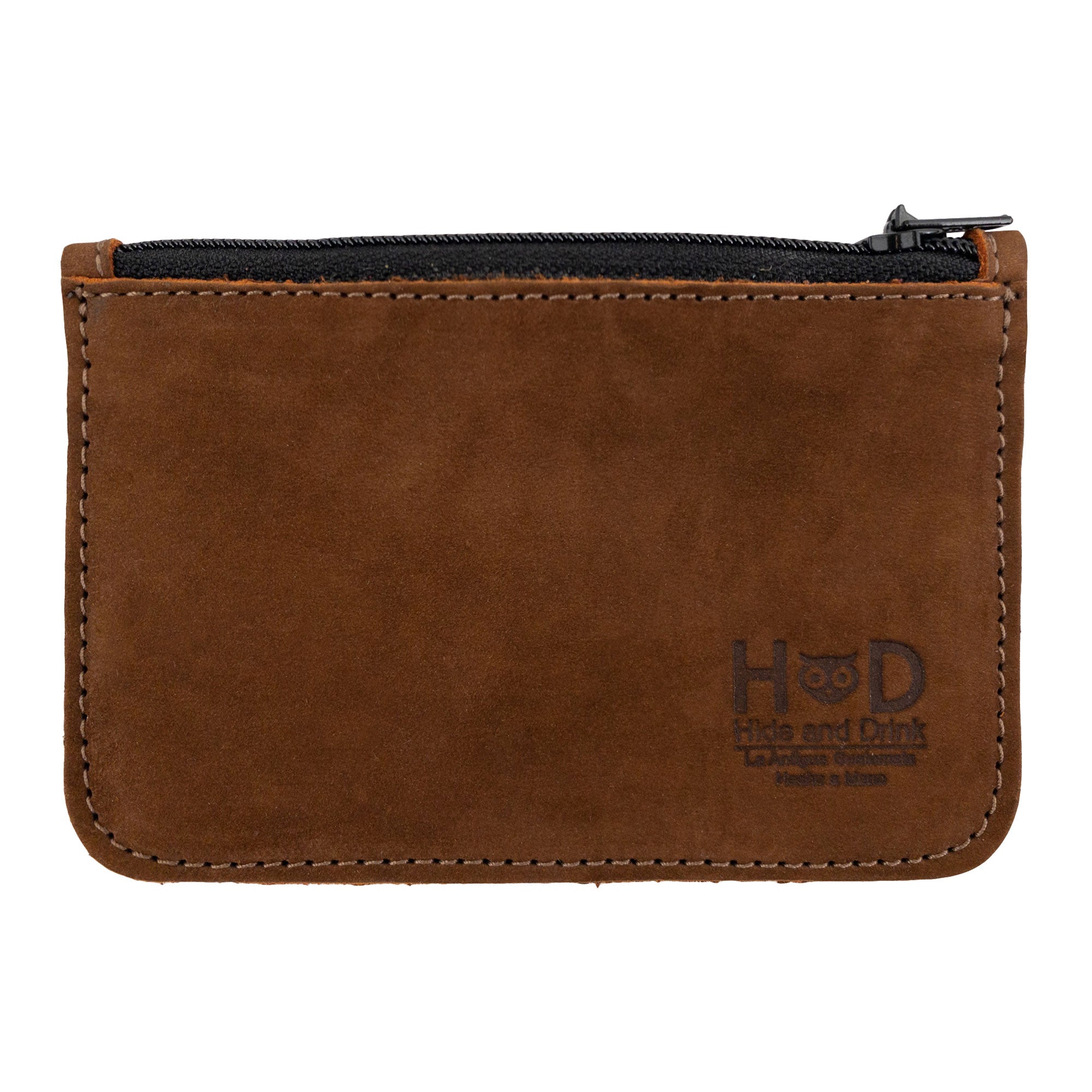 Hide & Drink Zippered Wallet featuring a sleek, full grain leather design, perfect as a card case and for folded bills storage. This artisan-crafted wallet is a stylish travel accessory, ideal for organizing coins and essentials. Handmade in La Antigua Guatemala and Oaxaca Mexico.