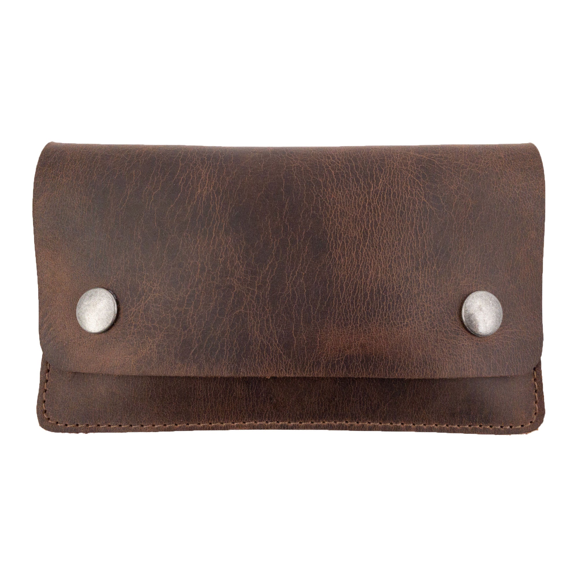 Front view of the Double Snap Tobacco Pouch by Hide & Drink, showcasing its classic style in soft full grain leather. Perfect for smokers, this handmade pouch features a flat design ideal for travel accessories. Crafted with care in La Antigua Guatemala, it embodies small batch production and artisan craftsmanship.