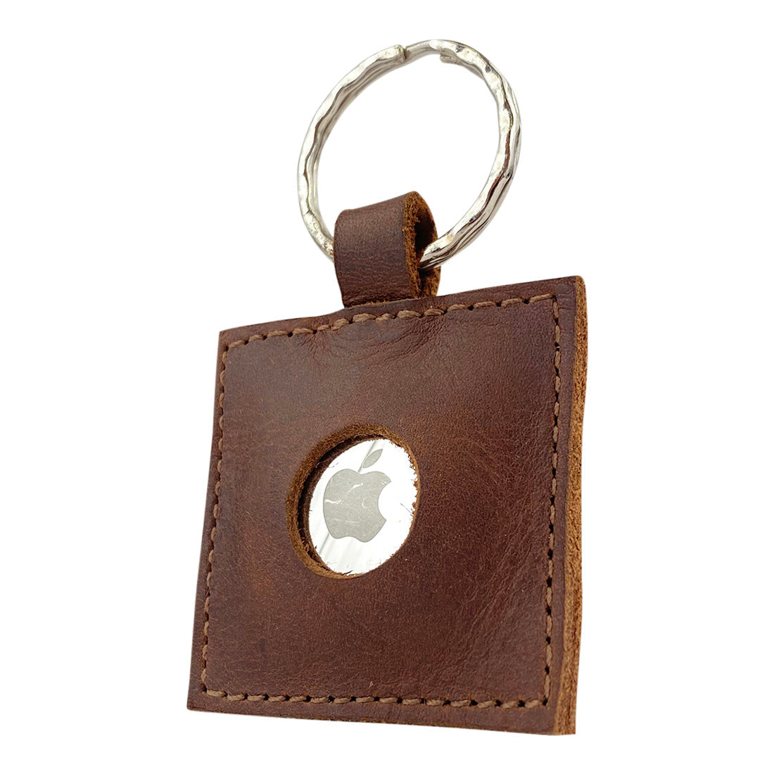 AirTag Squared Keychain by Hide & Drink displaying an AirTag, made from premium Full Grain Leather with a keyring for attachment. This Squared AirTag Keychain is perfect for keeping your valuables tracked, supporting small batch artisan production.