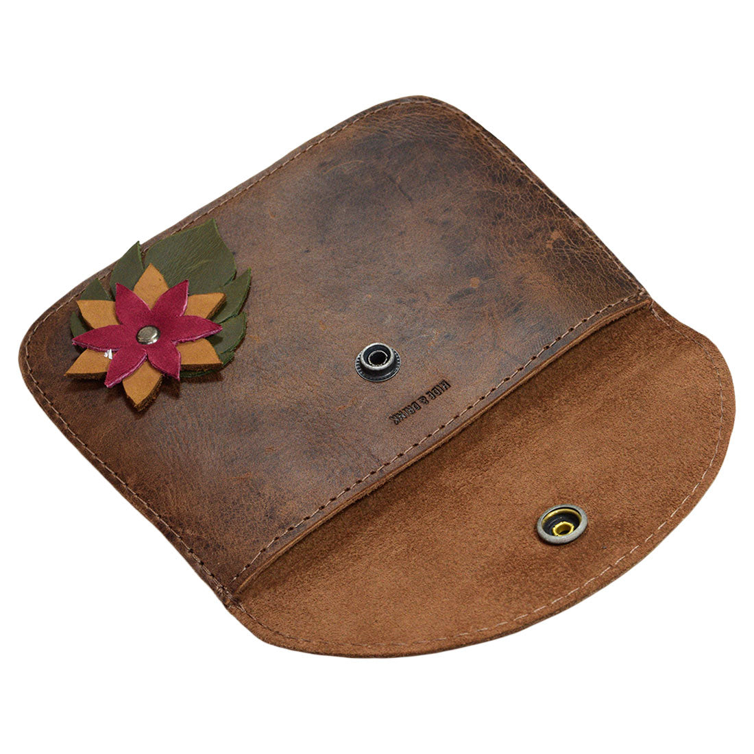 Inside view of Hide & Drink's Flower Card Wallet featuring a soft suede finish and vibrant flower accent. This Noche Buena Wallet is a versatile Coin & Cash Organizer that can also function as a cable holder or phone case. Crafted from high-quality Full Grain Leather, it's an excellent example of small batch production and artisan craftsmanship, handmade in La Antigua Guatemala & Oaxaca Mexico.