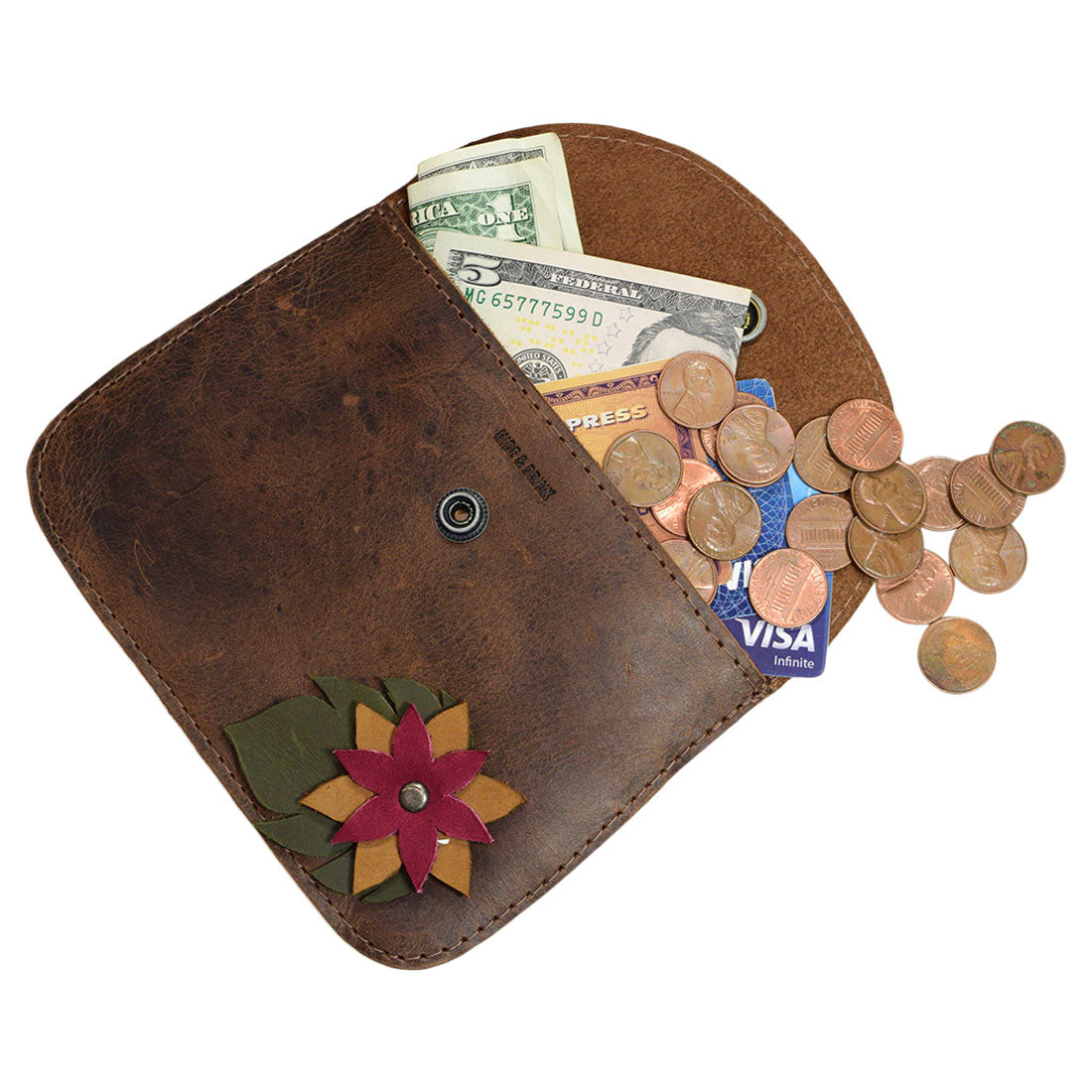 Open view of Hide & Drink's Flower Card Wallet displaying cash, coins, and cards. This multifunctional Noche Buena Wallet is a stylish Vintage Pouch and Coin & Cash Organizer made of durable Full Grain Leather. A perfect blend of artisan craftsmanship and practicality, it serves as both a cable holder and phone case, handmade with love in La Antigua Guatemala & Oaxaca Mexico.