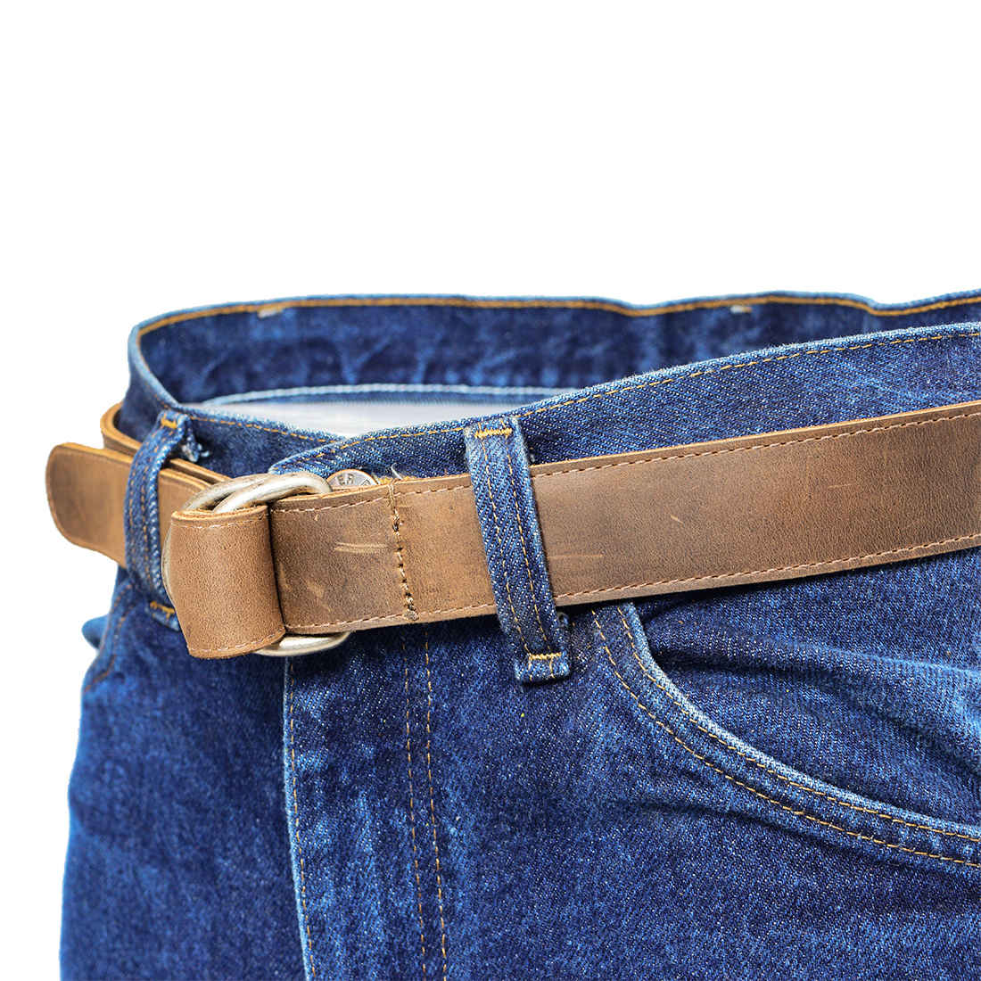 Hide & Drink D-Ring Leather Belt styled with denim, showcasing its versatility and quality. This 1.25 in. Wide Belt with D-Ring Buckle fits sizes 30 to 34. Constructed from durable Full Grain Leather, this belt is a testament to small batch production, hand cut, and hand sewn by artisans in La Antigua Guatemala & Oaxaca Mexico.