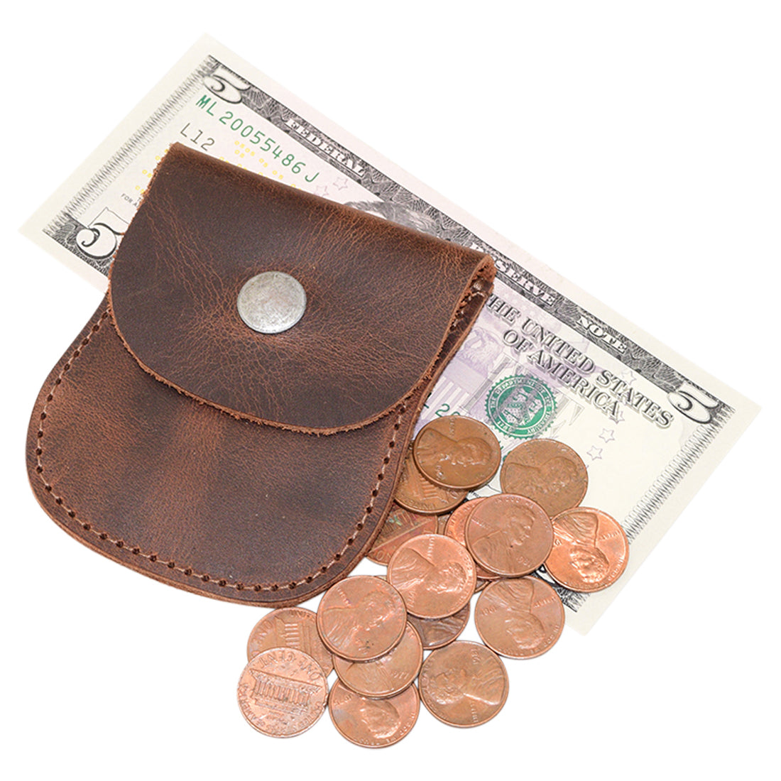 The Curvy Coin Pouch by Hide & Drink displayed with coins and a bill, illustrating its functionality as a pocket case for pennies and travel accessory made from durable full grain leather, showcasing small batch production.