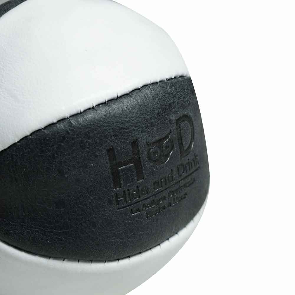 Close-up of a Hide & Drink Leather Juggling Ball from the (3-Pack), showcasing its elegant finish. Full Grain Leather Juggling Balls Set of 3, created with meticulous Small Batch Production, Hand Cut, Hand Sewn, and Fire Branded by Artisan craftspeople. Handmade in La Antigua Guatemala & Oaxaca Mexico.