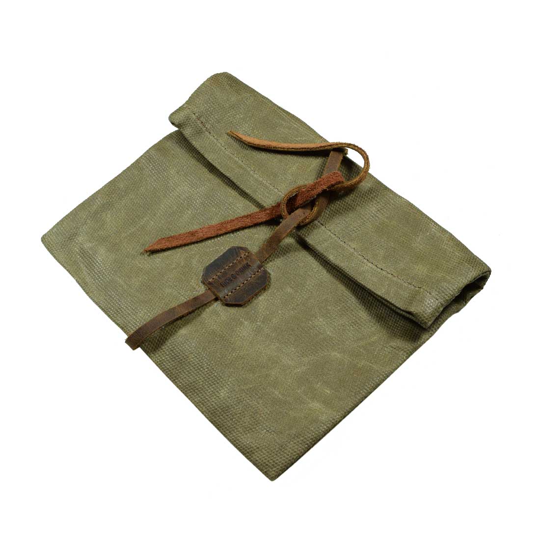Showcasing Hide & Drink's Rolling Pouch, a chic Survival Roll Top Pouch with classic style. This Waxed Canvas & Full Grain Leather lightweight case is perfect for your camping essentials, hand cut and hand sewn by artisans in La Antigua Guatemala & Oaxaca, Mexico.