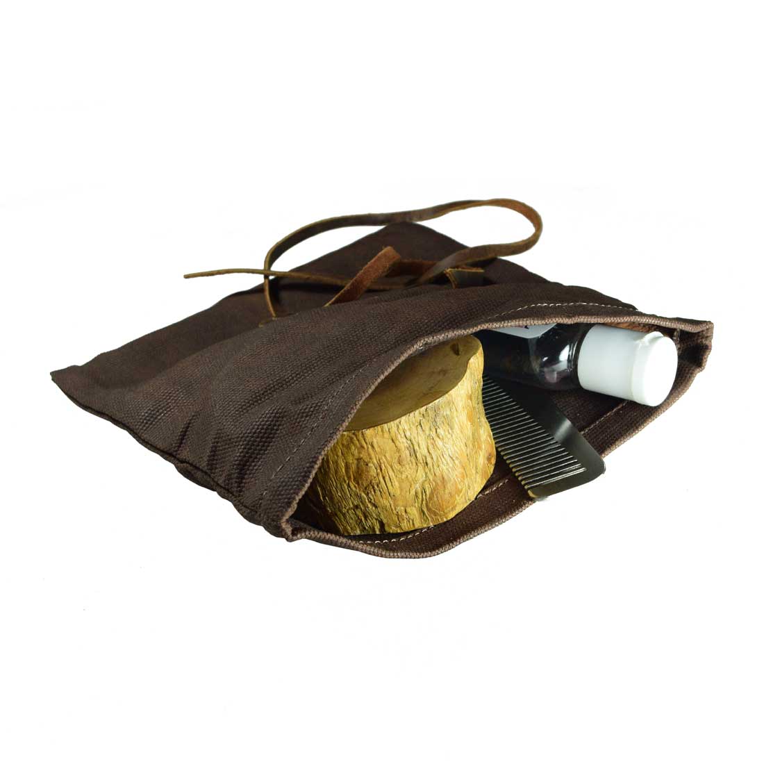 Explore Hide & Drink's Rolling Pouch, featuring a unique design as a Survival Roll Top Pouch. Made from Waxed Canvas & Full Grain Leather, this artisan-crafted lightweight case is perfect for all your outdoor accessories, made in La Antigua Guatemala & Oaxaca, Mexico.