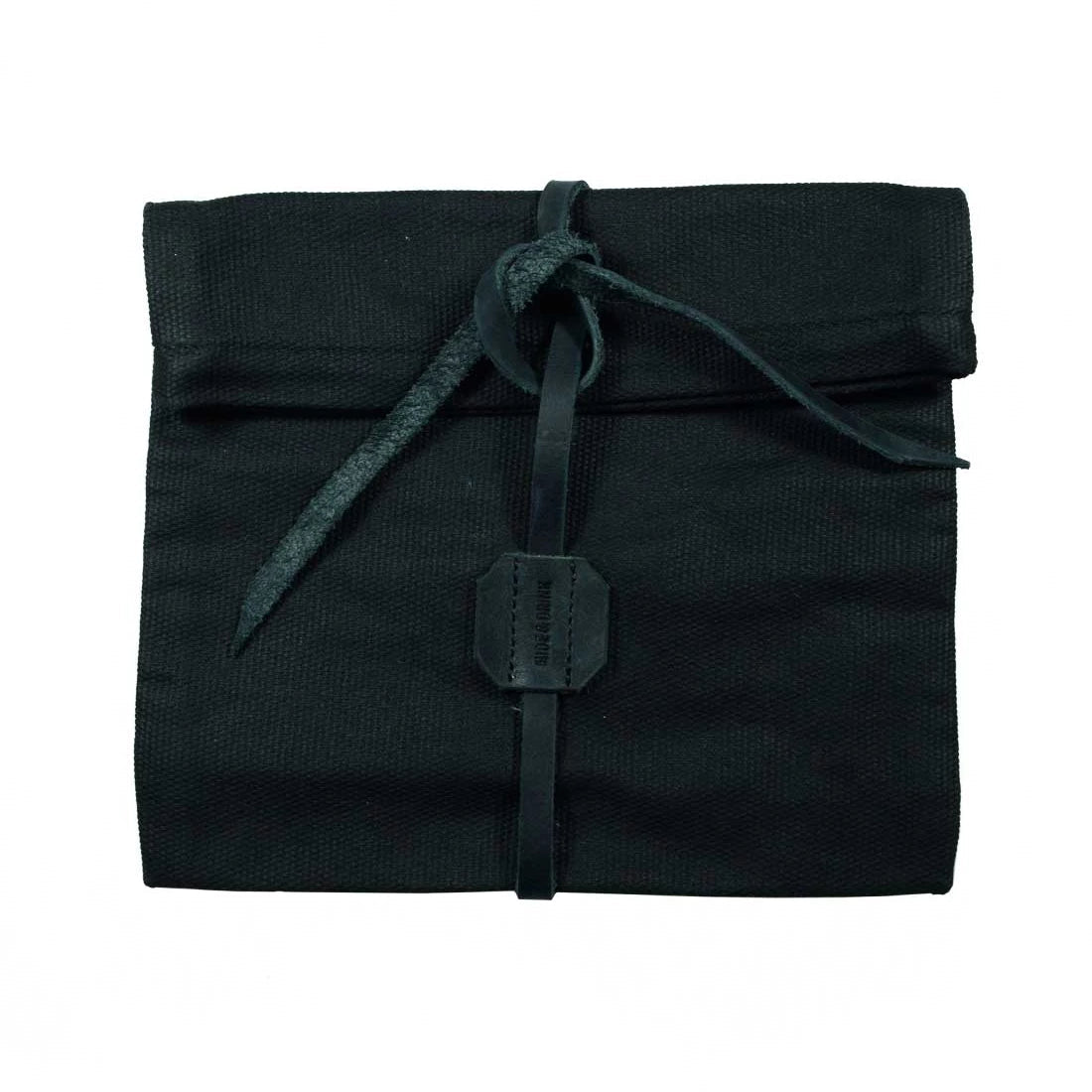 Explore Hide & Drink's Rolling Pouch, a chic Survival Roll Top Pouch made from robust Waxed Canvas & Full Grain Leather. Ideal as a lightweight case for your outdoor accessories, this artisan piece is crafted in La Antigua Guatemala & Oaxaca, Mexico.