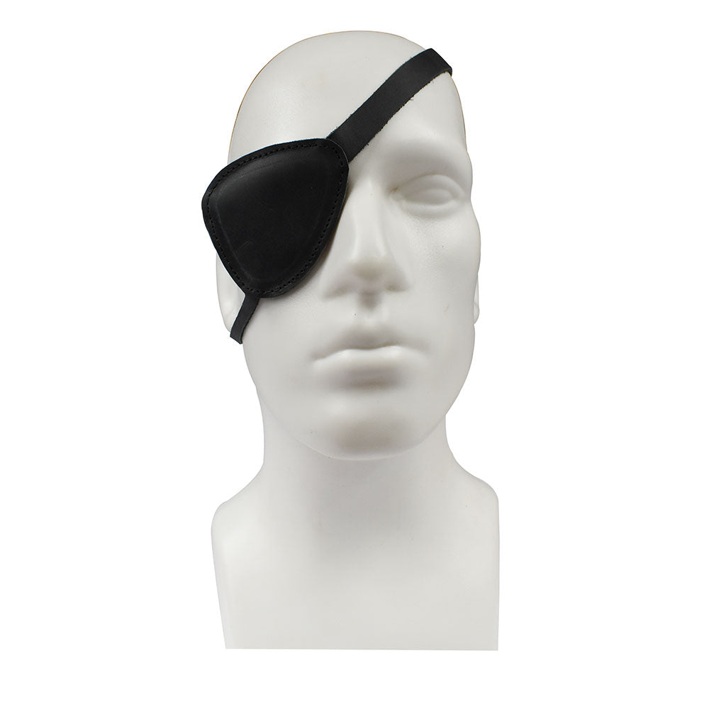 A sleek Eye Patch from Hide & Drink worn on a mannequin, showcasing its premium Full Grain Leather design. This unique handmade item is ideal for Halloween Pirate Costumes and Carnival Masks, demonstrating small batch production and artisan craftsmanship that stands out as a perfect cosplay accessory, made in La Antigua Guatemala & Oaxaca Mexico.