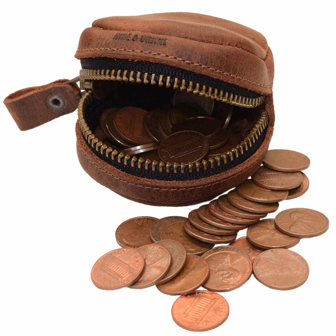 Hide & Drink Rounded Coin Case filled with coins, made of Full Grain Leather, showcasing the beauty of artisan craftsmanship with small batch production. Features hand cut and hand sewn details, fire branded logo, and handmade in La Antigua Guatemala & Oaxaca Mexico.