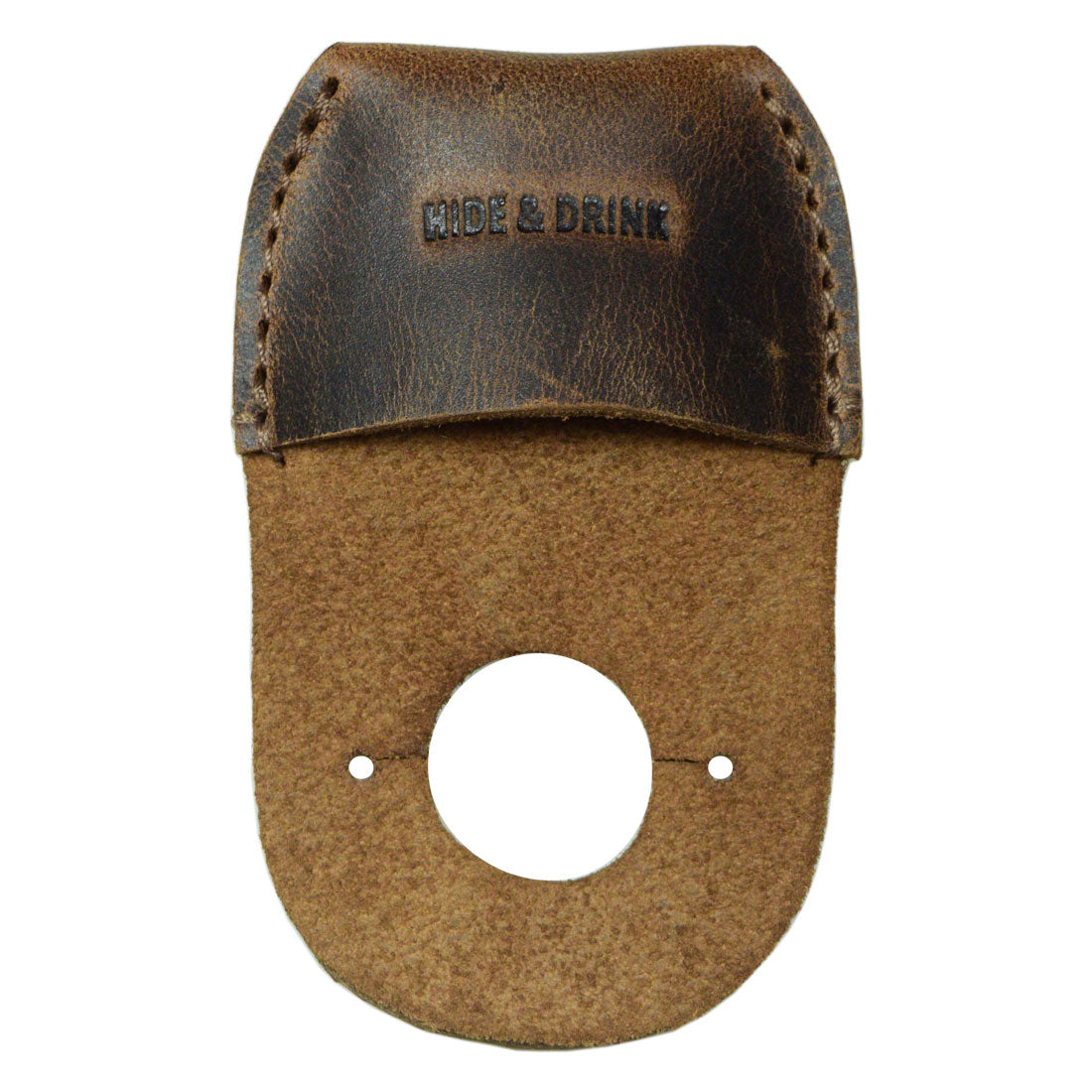 A detailed view of the Hide & Drink Thumb Guard made from Full Grain Leather, featuring a finger hole design. This artisan-crafted Finger Protector is ideal for carpenters and carving enthusiasts. Proudly handmade in La Antigua Guatemala, this durable and stylish accessory embodies small batch production, hand cut and hand sewn craftsmanship.