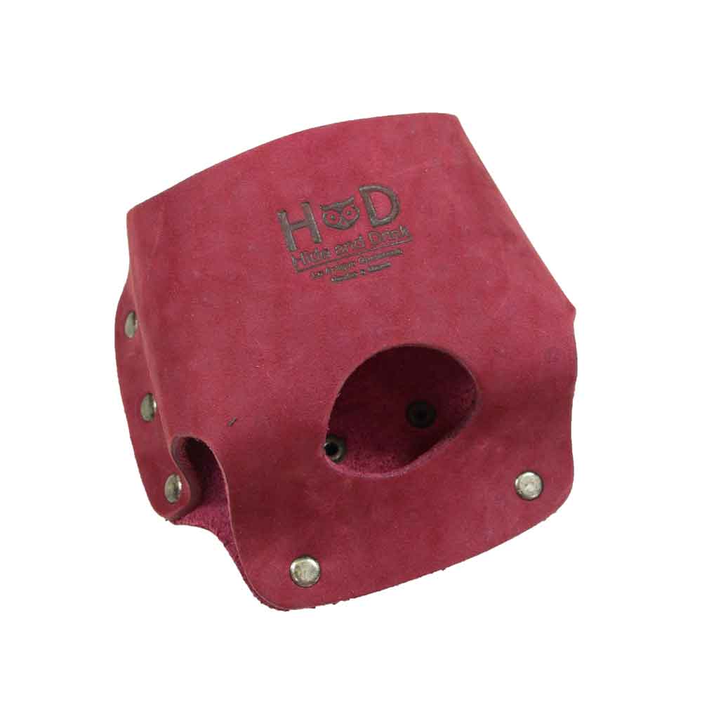 Hide & Drink's Large Tape Holster next to a convenient branding card, reflecting its artisan craftsmanship. This tool holster is perfect for electricians needing a durable solution for their Large Tape Measure.