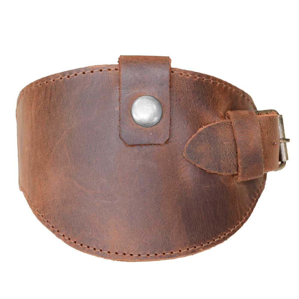 Front view of the Motorcycle Boot Protector by Hide & Drink, showcasing its durable buckle closure for optimal shoe protection from the shifter. This rustic shoe cover embodies beautiful full grain leather craftsmanship, ideal for bikers. Handmade in La Antigua Guatemala, it's a strong piece of rustic guard gear for any rider.