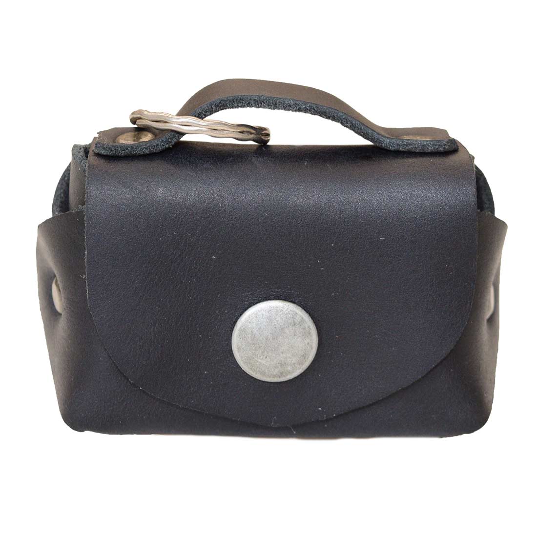 Front view of the black Tiny Handbag Keychain by Hide & Drink showing its unique design and key ring holder. Made with Full Grain Leather, this piece represents artisan quality and small batch production ethos, combining function and style.