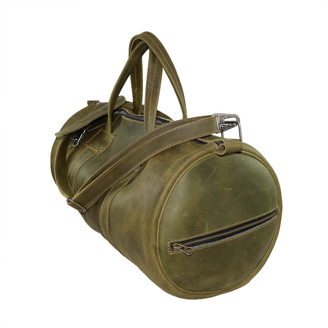 Classic Duffle Bag by Hide & Drink in dark green, demonstrating its rich leather texture and adjustable strap with zipper closure. This Full Grain Leather Classic Duffle Bag is a stylish Messenger Bag, perfect for travel, crafted by artisans in La Antigua Guatemala & Oaxaca Mexico.