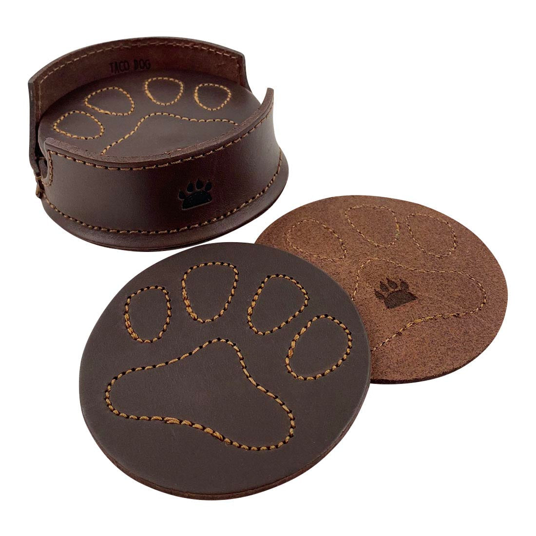 Collection of Taco Dog Paw Print Coasters next to their holder, featuring distinctive stitching. This set of 6 with holder is a wonderful addition to home decor, shields your table from hot & cold drinks, and is a delightful gift for dog lovers. Hand crafted from full grain leather in La Antigua Guatemala.