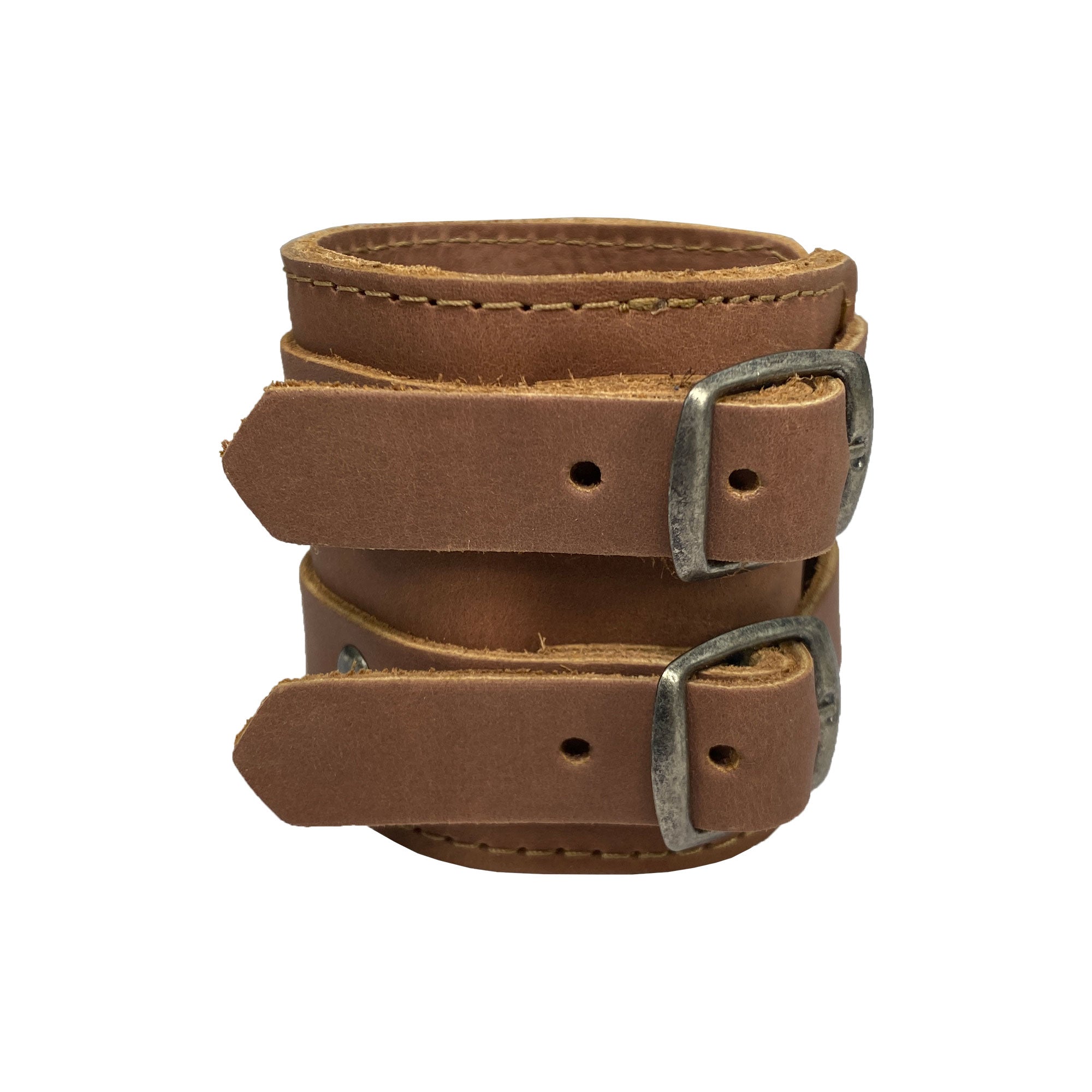 Close-up of the Wrist-Wallet-Cuff by Hide & Drink, emphasizing its durable Full Grain Leather construction, perfect for everyday use, brought to you by StockyardX, with small batch production and handmade techniques that reflect the artisan quality from La Antigua Guatemala & Oaxaca Mexico.