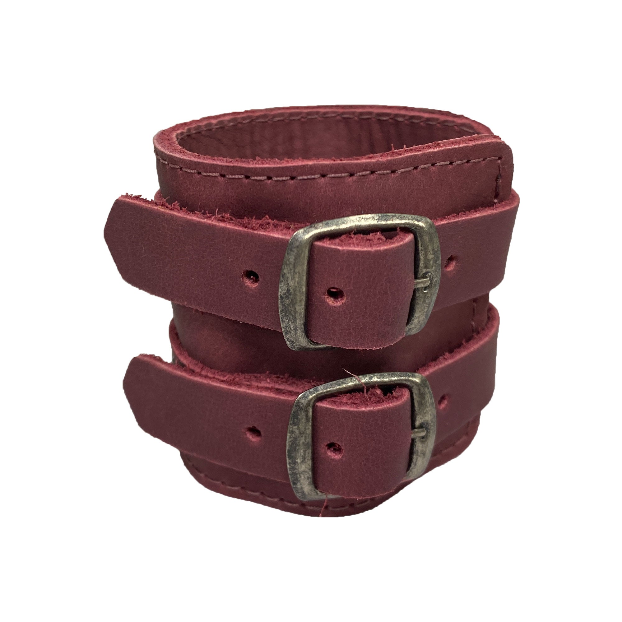 Display of Hide & Drink's Wrist-Wallet-Cuff made from premium Full Grain Leather, featuring a unique rustic leather bracelet design. The hidden pouch for bills and inner zippered pouch provide practicality along with style. Each piece is lovingly handmade in La Antigua Guatemala & Oaxaca Mexico, emphasizing small batch production.