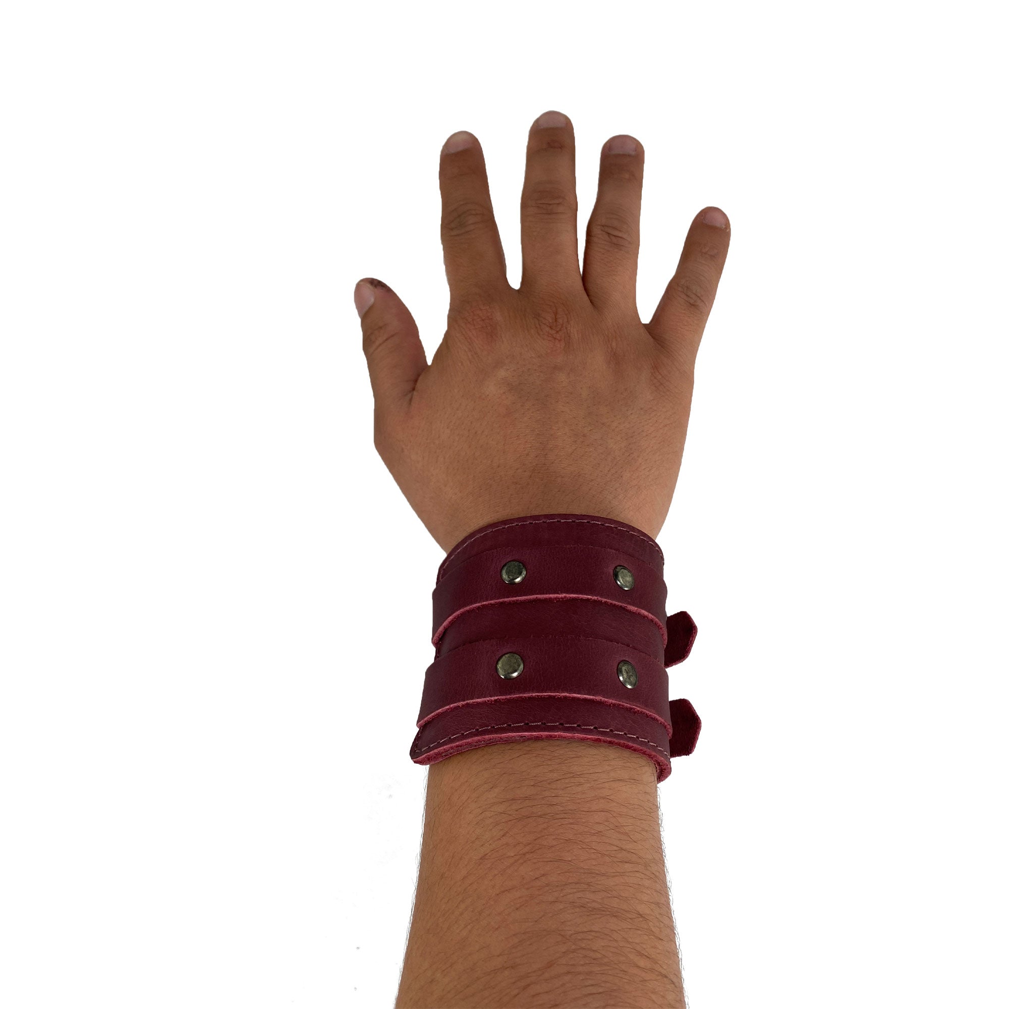 Showcasing Hide & Drink's Wrist-Wallet-Cuff, elegantly crafted from Full Grain Leather. This rustic leather bracelet features a hidden pouch for bills and an inner zippered pouch, perfect for organized storage. Artisan-made in La Antigua Guatemala & Oaxaca Mexico, it highlights the commitment to quality craftsmanship.