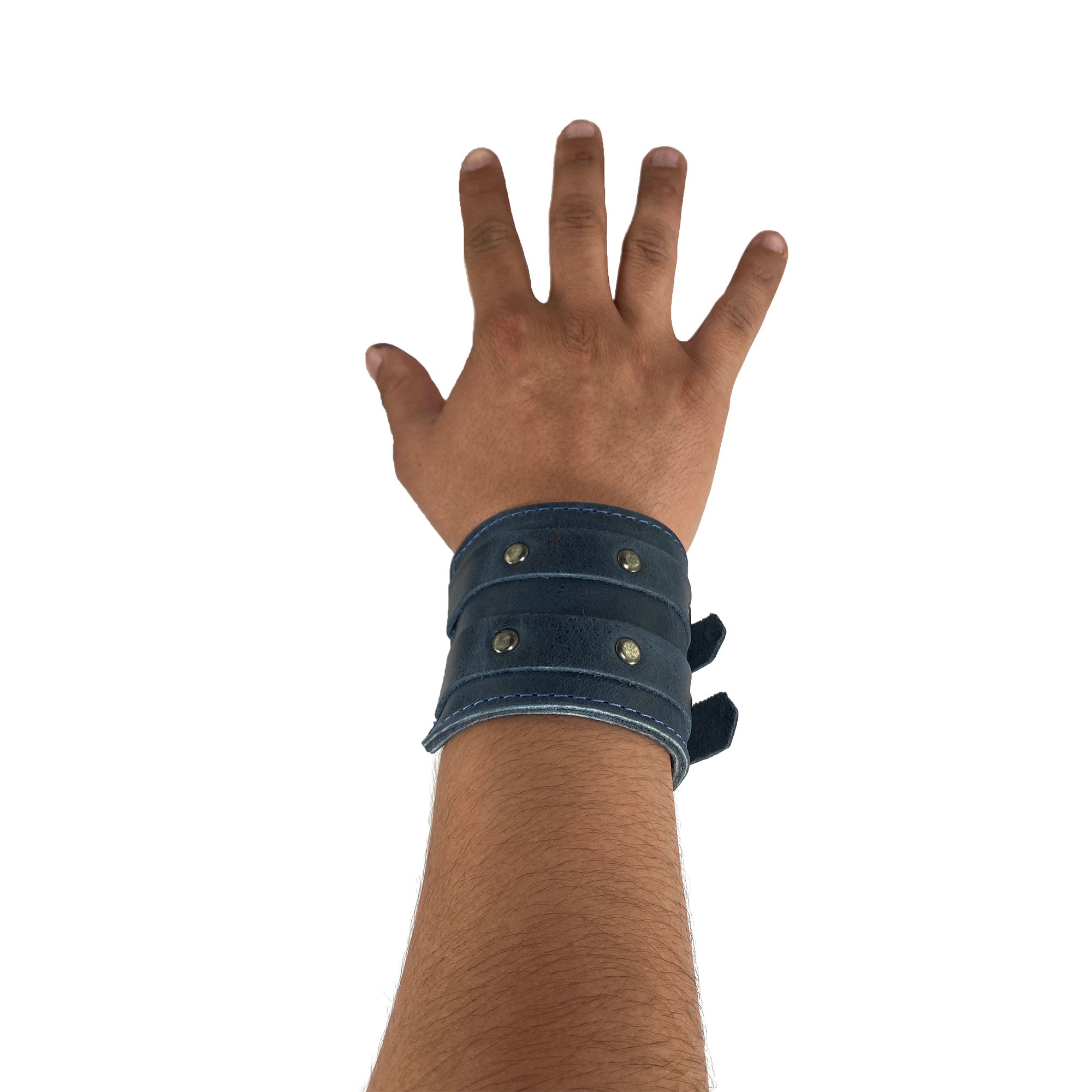 A close view of Hide & Drink's Wrist-Wallet-Cuff, demonstrating its Full Grain Leather craftsmanship. This rustic leather bracelet features a hidden pouch for bills and an inner zippered pouch, making it a practical accessory. Artisan-crafted in La Antigua Guatemala & Oaxaca Mexico, exemplifying small batch production.