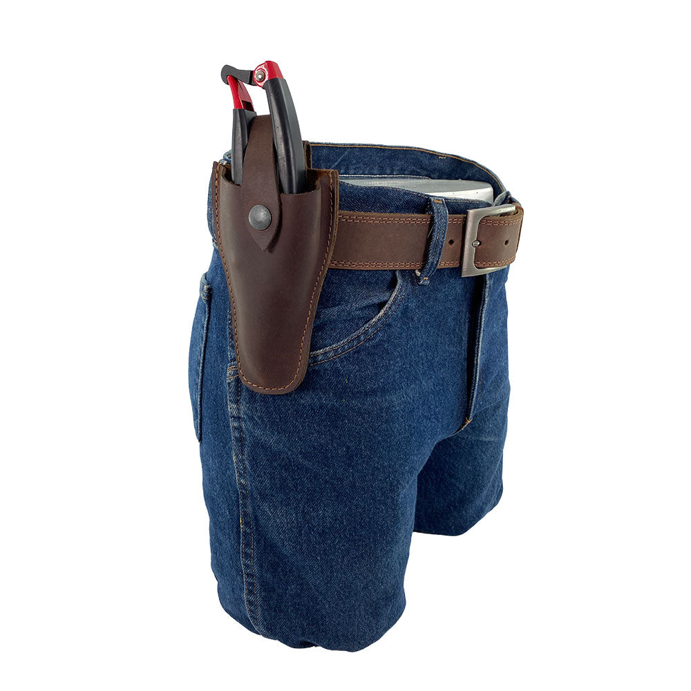 Hide & Drink Gardening Scissors Holster showcased on a belt loop, illustrating its practical design for hands-free access to gardening tools. This pruner sheath is made of quality full grain leather, handcrafted with care for gardening enthusiasts.