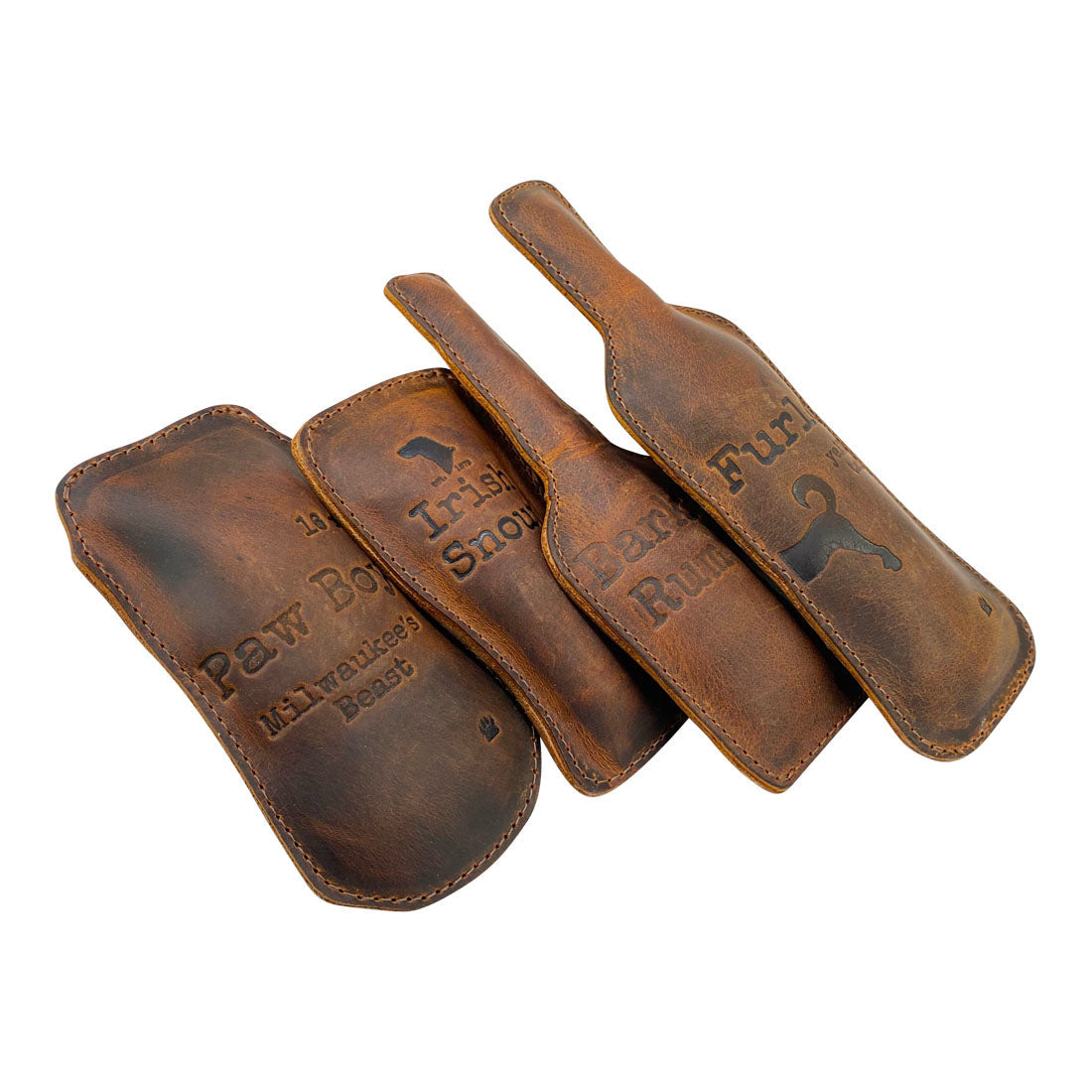 Taco Dog Dog Chew Toys (4 Pieces), featuring the charming designs of Paw Boy, Irish Snout, Bark Rum, and Furlot. These artisan pet toys, suitable for small breeds and enthusiastic chewers, are crafted from full grain leather in small batch production.