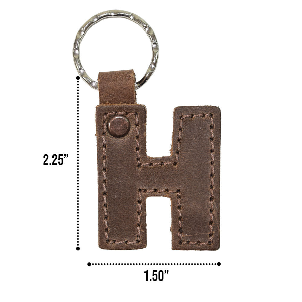 Stylish 'M' thick leather Alphabet Letter Keychain from Hide & Drink, ideal for personalizing and organizing your keys. Handcrafted with care in La Antigua Guatemala.