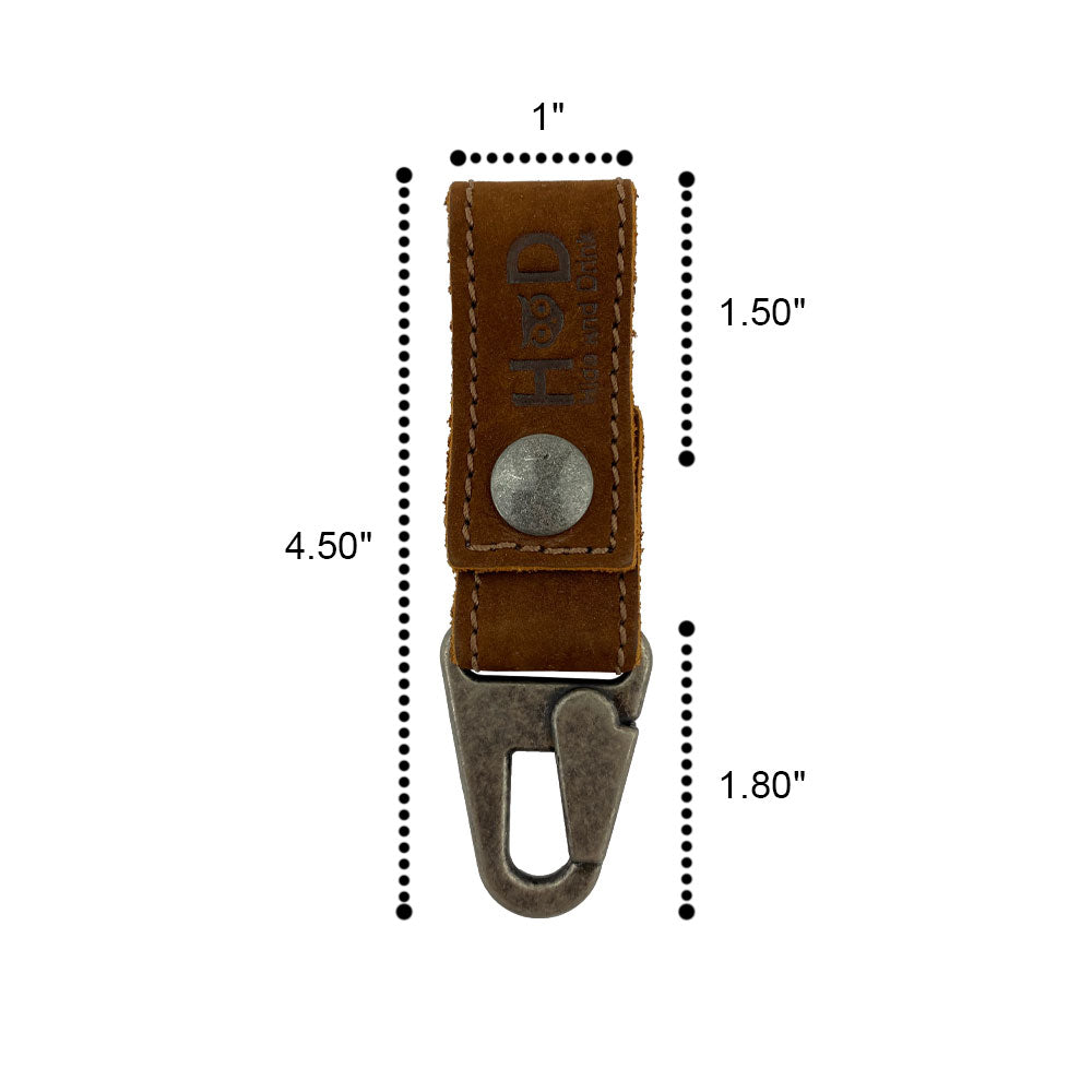Close-up of the Key Ring Holder by Hide & Drink measuring 1 Inch wide and 5.5 Inches long. This premium Full Grain Leather holder embodies Small Batch Production and artisanal craftsmanship. Handmade in La Antigua Guatemala & Oaxaca Mexico.