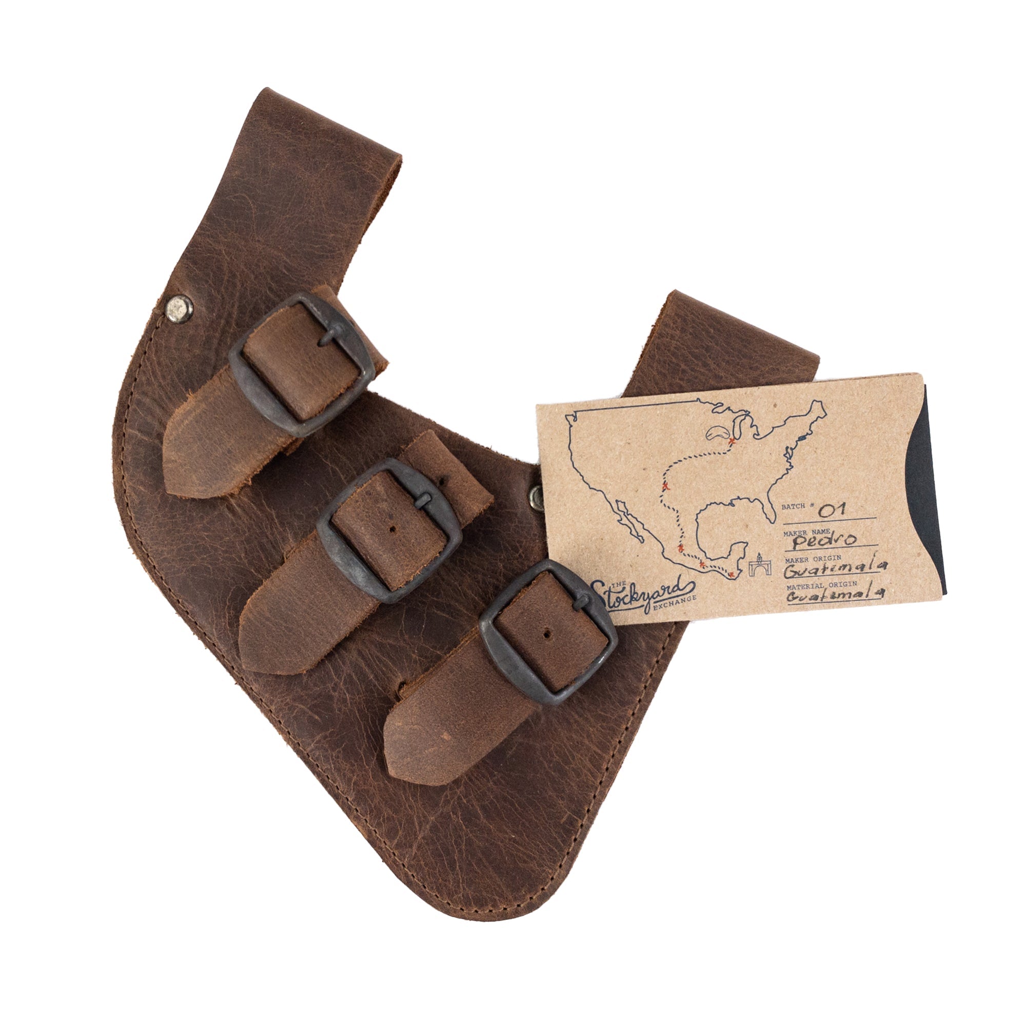 The Medieval Sword Holder with 3 Buckles showcased by Hide & Play along with a personalized tag highlighting its unique creation. This Full Grain Leather holder serves as an ideal Historical Costume Accessory, perfect for Fantasy Cosplay. Trust the Small Batch Production method involving Hand Cut, Hand Sewn, and Fire Branded techniques from artisans in La Antigua Guatemala & Oaxaca Mexico.