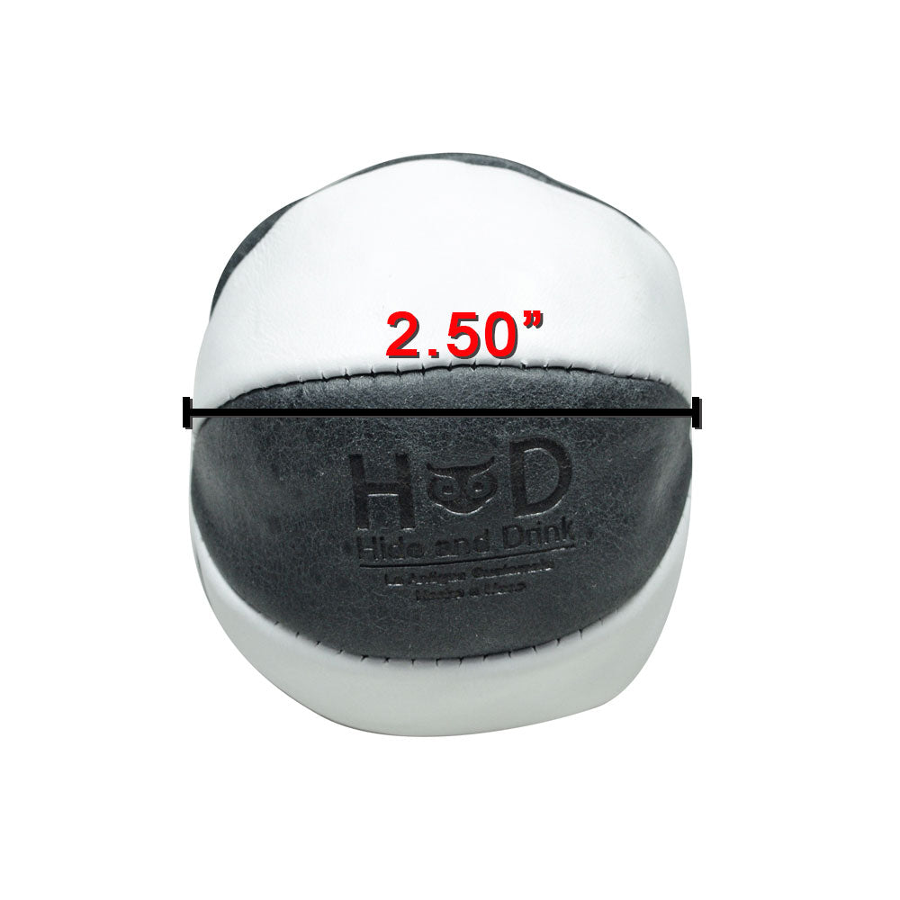 Detailed view of Hide & Drink Leather Juggling Ball from the (3-Pack) highlighting its craftsmanship. Full Grain Leather Juggling Balls Set of 3 crafted with Small Batch Production techniques, Hand Cut, Hand Sewn, and Fire Branded by skilled Artisans. Handmade in La Antigua Guatemala & Oaxaca Mexico.