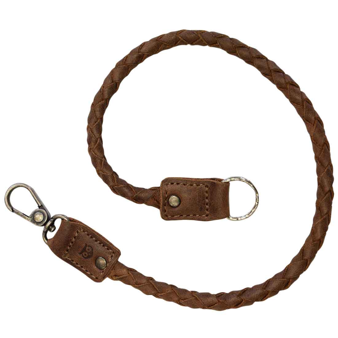 Biker Chain by Hide & Drink with a classic braided look, perfect for use as a key lanyard for wallet. This rustic keychain is made from full grain leather, highlighting the craftsmanship of small batch production. Features include hand cut, hand sewn, and fire branded elements, artisan created in La Antigua Guatemala & Oaxaca Mexico.