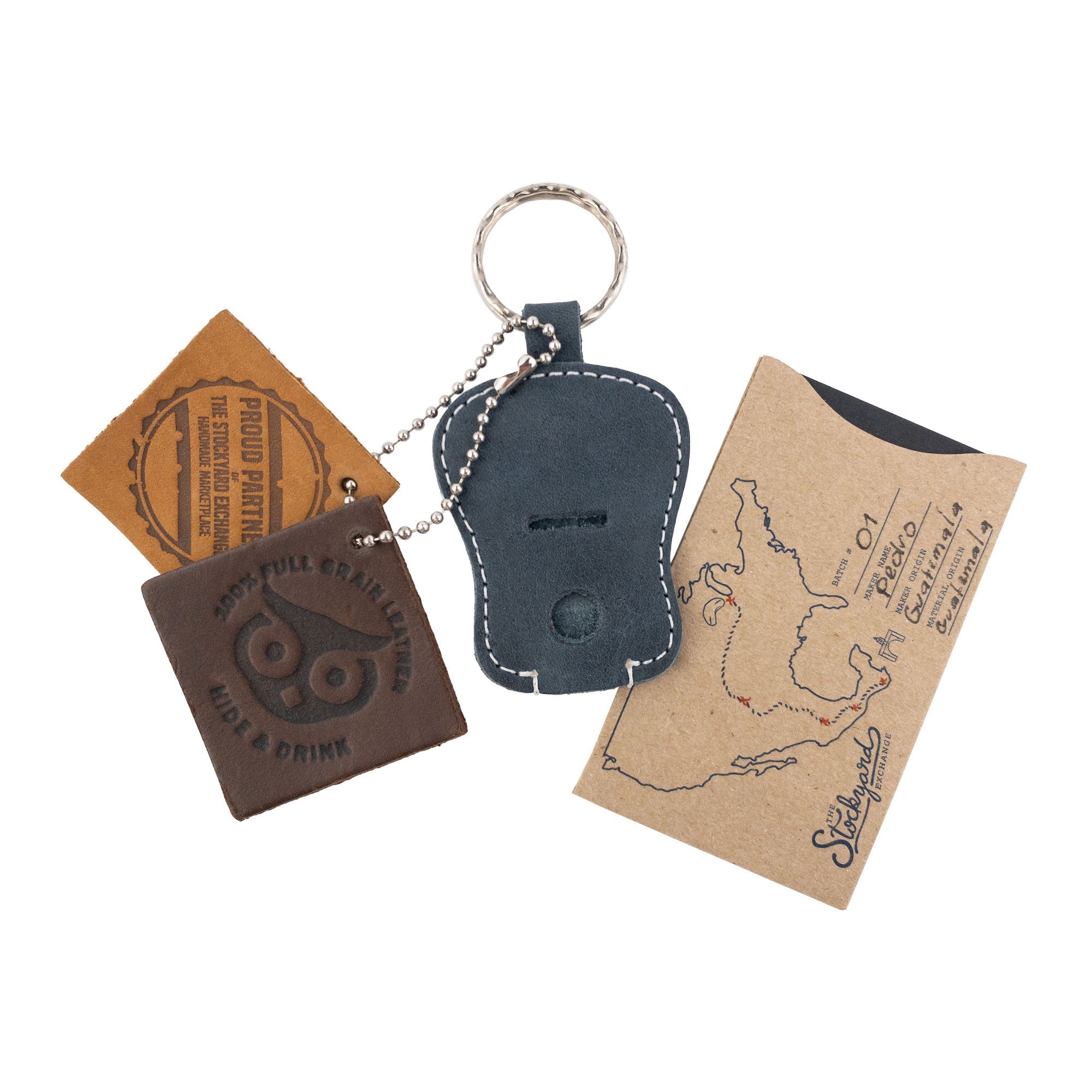 Guitar Keychain by Hide & Drink revealing the meticulous craftsmanship in its design. Handmade from durable Full Grain Leather, this key holder reflects the quality of artisan skills in small batch production from La Antigua Guatemala & Oaxaca Mexico.