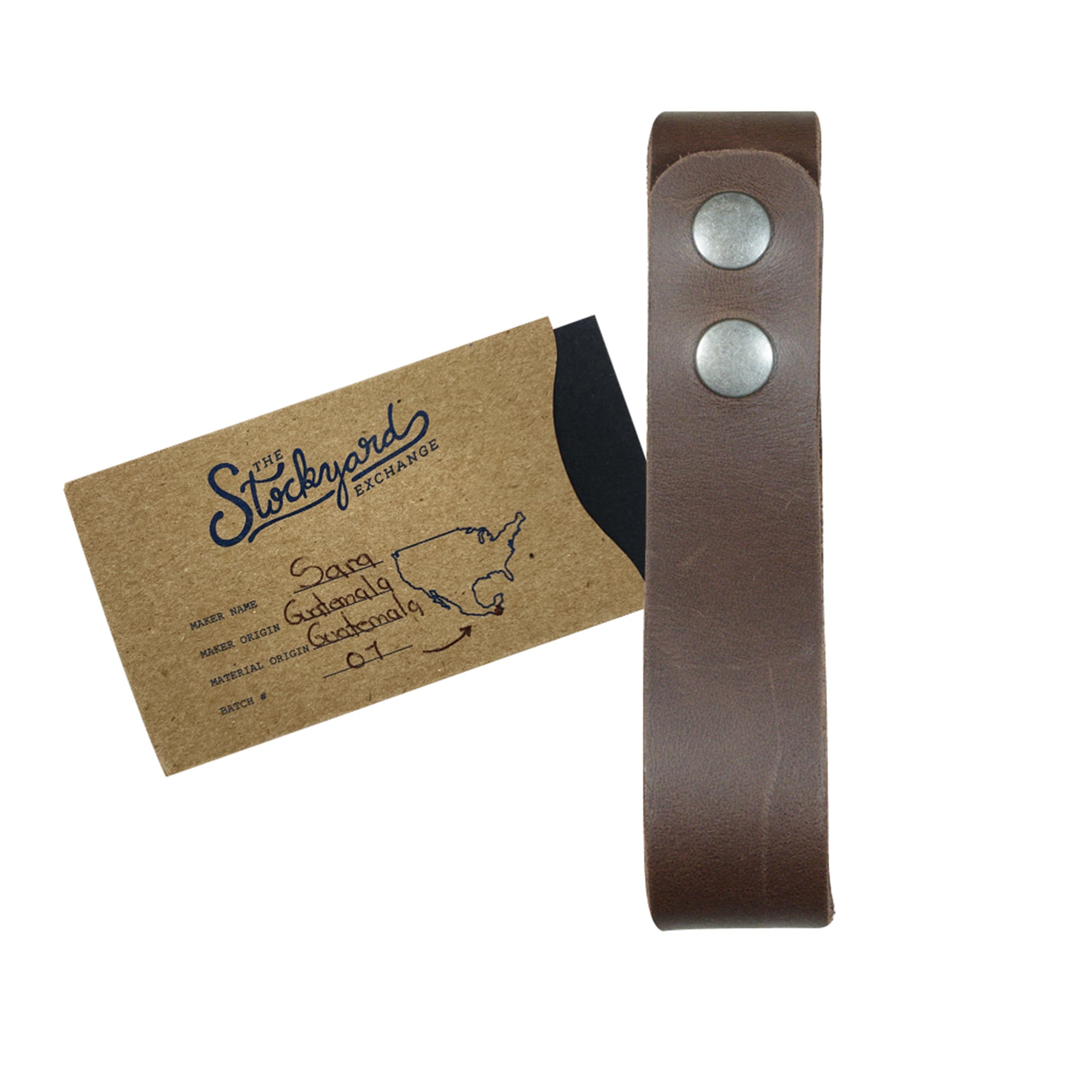 Thick Whip Holder by Hide & Play, displayed with a tag that shows its artisan details highlighting it as a whip holster made from thick full grain leather. This belt loop bullwhip holder is suitable for pastoral tools and symbolizes the commitment to small batch production through hand cut, hand sewn methods and fire branded craftsmanship, made in La Antigua Guatemala & Oaxaca Mexico.