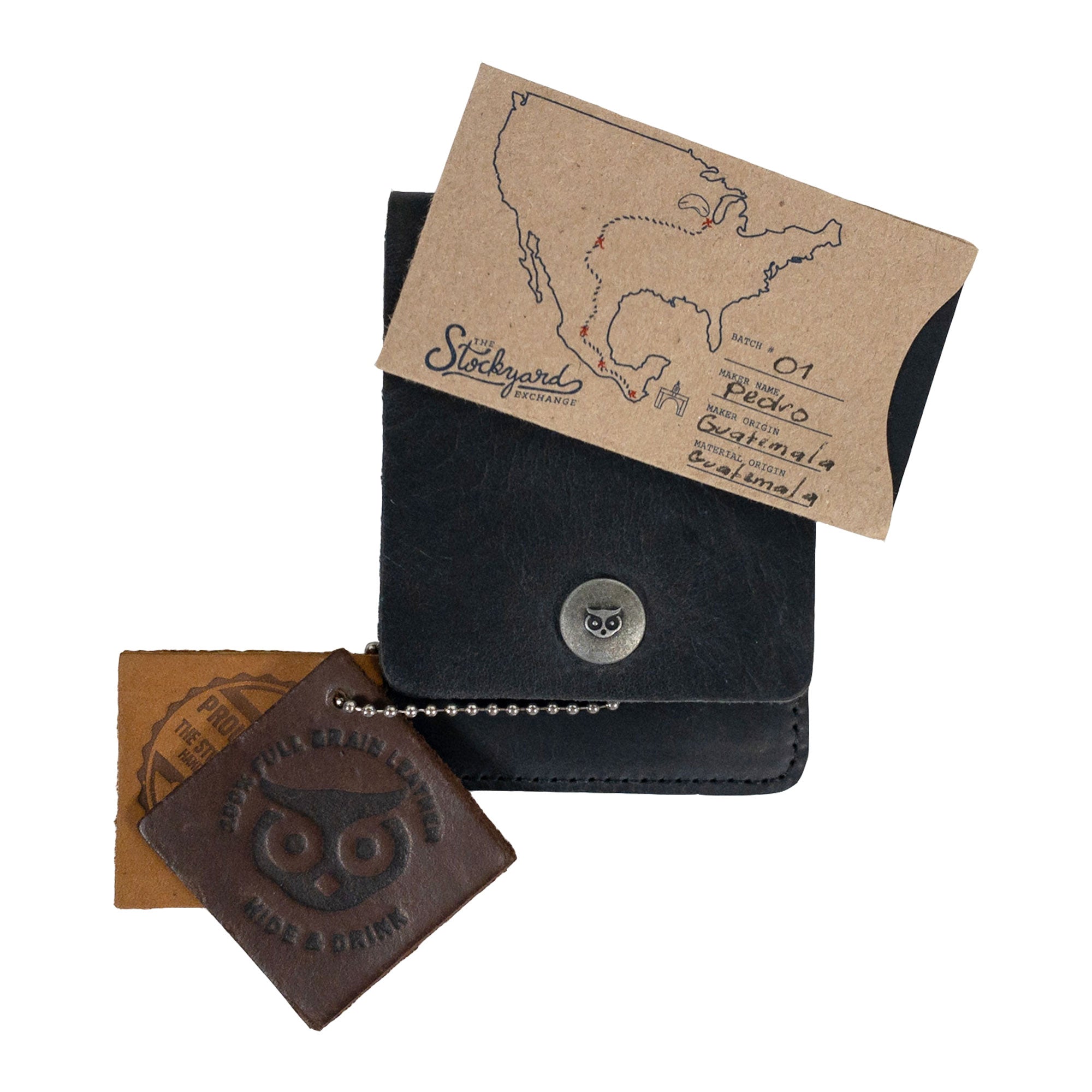 Vertical Wallet by Hide & Drink styled with business cards, showcasing versatility and elegance. This Vertical Front Pocket Wallet with Card Slot ensures compact storage for bills and cards, crafted from full grain leather emphasizing small batch artistry with hand cut, hand sewn details and fire branded signs of authenticity. Handmade in La Antigua Guatemala & Oaxaca Mexico.