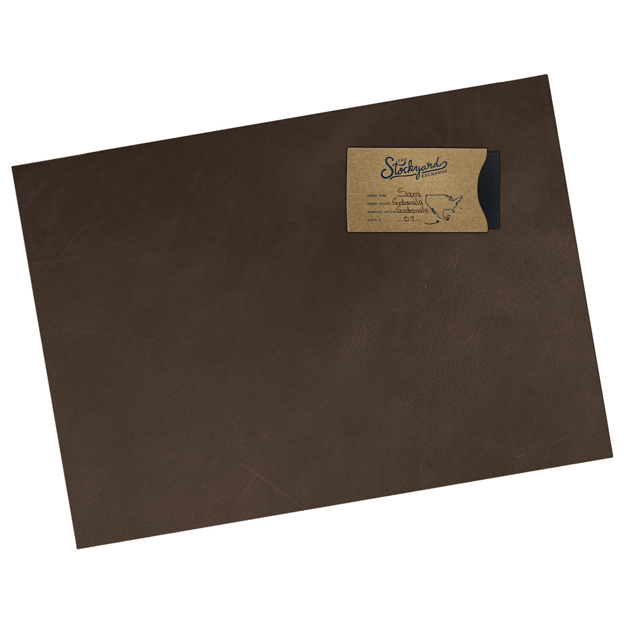 An artistic angle of a dark brown Leather Rectangle 8 x 11 in. from Thick Full Grain Leather (2.6 to 2.8mm) by Leather Handcraft Supply Depot showcasing its elegance. This Full Grain Leather Rectangle (8 X 11 in.) from Thick Full Grain Leather (2.6 to 2.8mm) is perfect for creative DIY projects and hobby workshops, hand sewn and crafted in La Antigua Guatemala & Oaxaca Mexico.