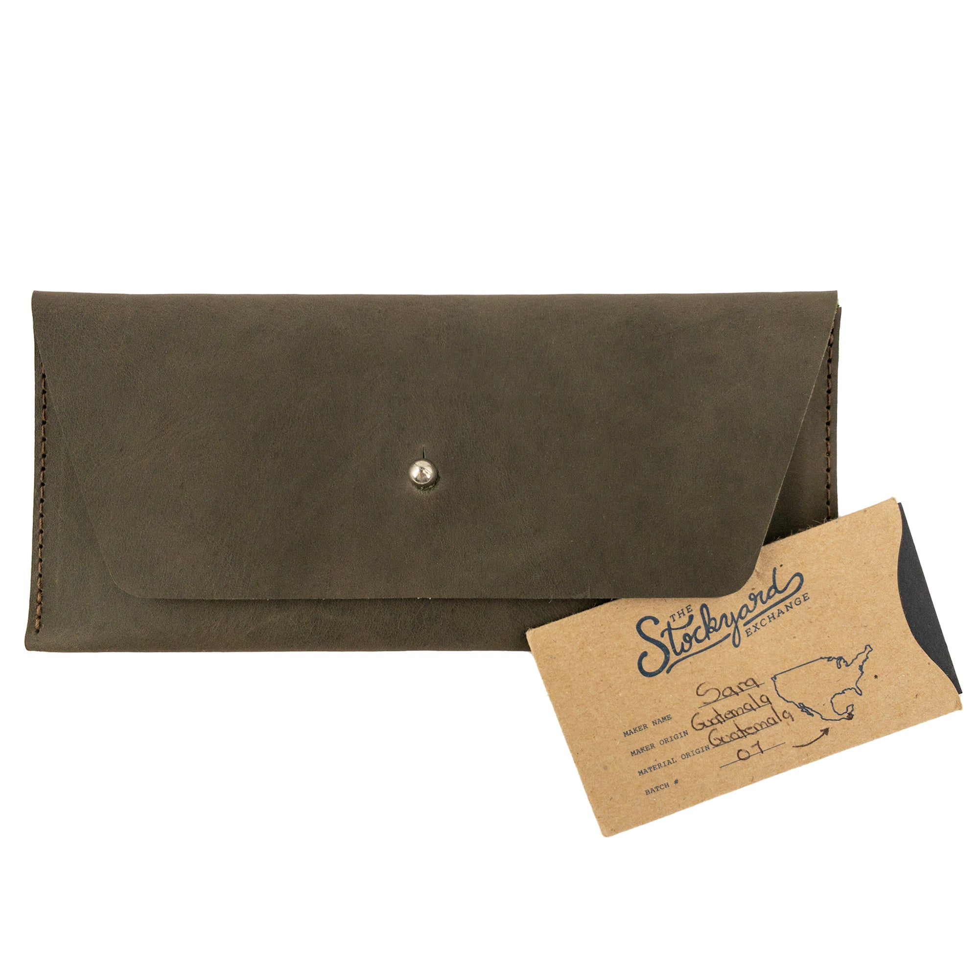 Presenting the Long Utility Pouch in green leather from Hide & Drink, displayed with a gift card indicating its potential as a thoughtful present. Perfect for organizing cash and cards.