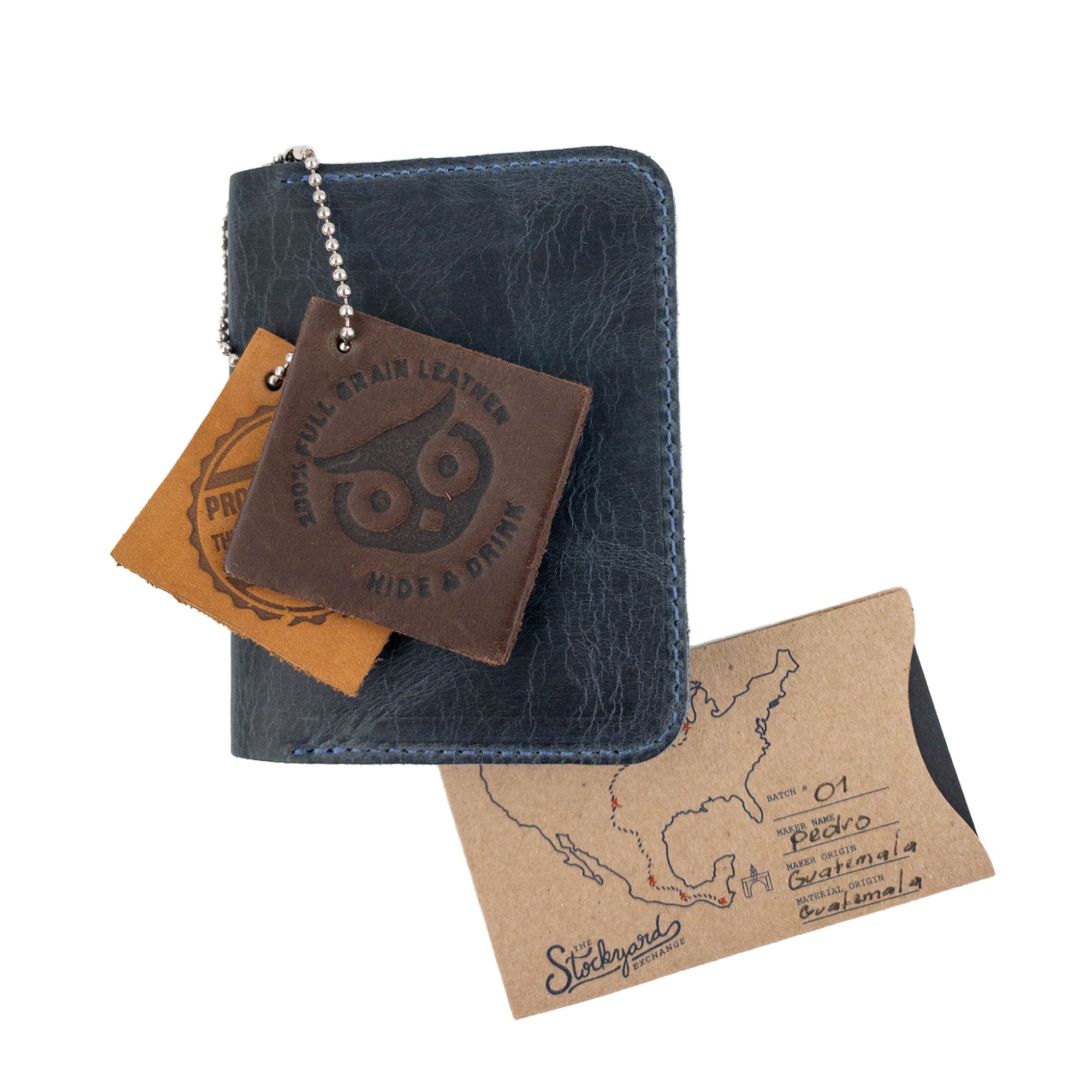 Navy Bi-Fold Card Wallet Diagonal by Hide & Drink displayed open, emphasizing its practical design for cards and cash organization, crafted from high-quality leather.