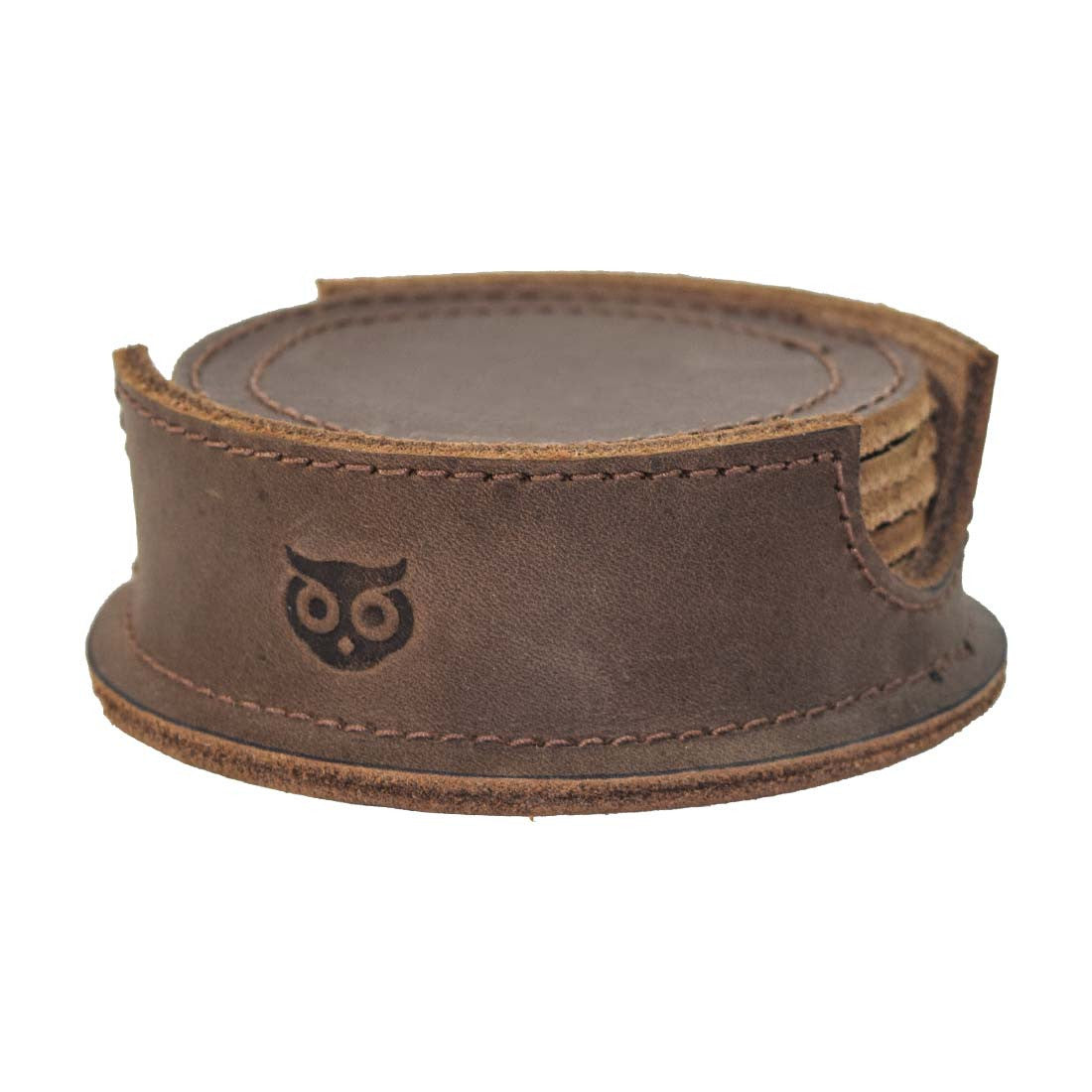 Thick Leather Coasters (6-Pack) by Hide & Drink displayed in a coaster holder, showcasing the elegant craftsmanship of circular coasters made from premium full grain leather. These artisan coasters are part of small batch production, hand cut, hand sewn, and fire branded, handmade in La Antigua Guatemala.