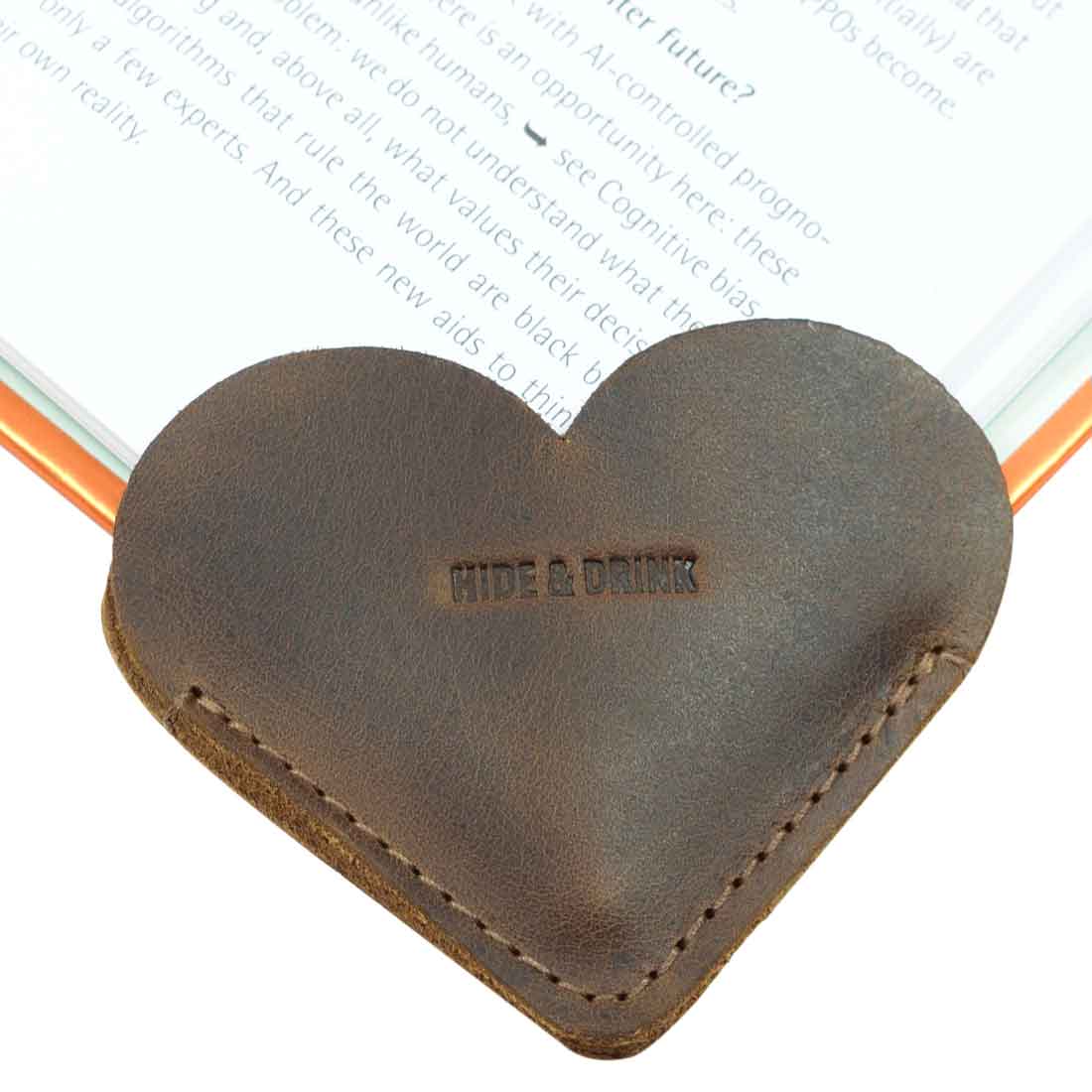 Leather Corner Heart Bookmark (2 pack) by Hide & Drink, featuring a practical heart design made from Full Grain Leather. This artisan product is handcrafted in La Antigua Guatemala and Oaxaca Mexico, showcasing small batch production with meticulous hand cut and hand sewn techniques.