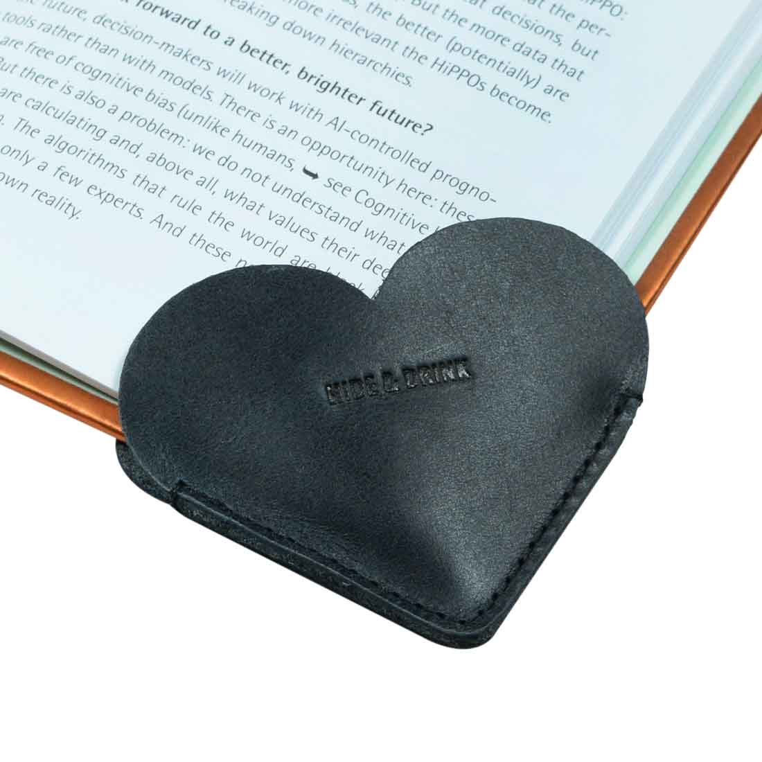 Leather Corner Heart Bookmark (2 pack) in black from Hide & Drink, made from durable Full Grain Leather. This handmade product showcases artisan craftsmanship from La Antigua Guatemala and Oaxaca Mexico, utilizing small batch production.