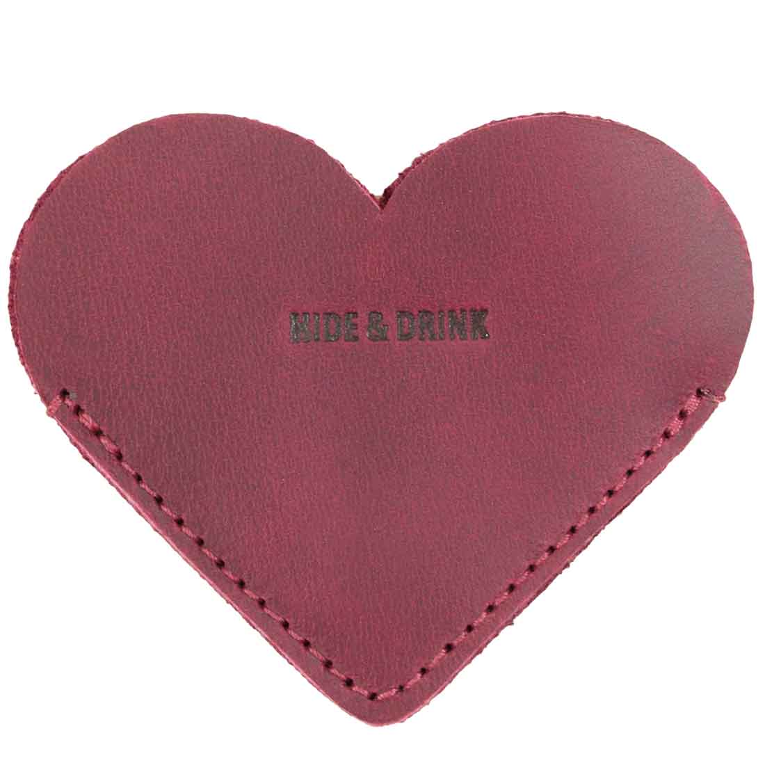 Burgundy Leather Corner Heart Bookmarks (2 pack) by Hide & Drink, designed for beauty and functionality, made with Full Grain Leather. Handmade in La Antigua Guatemala and Oaxaca Mexico, this product demonstrates small batch production and artisan skills.