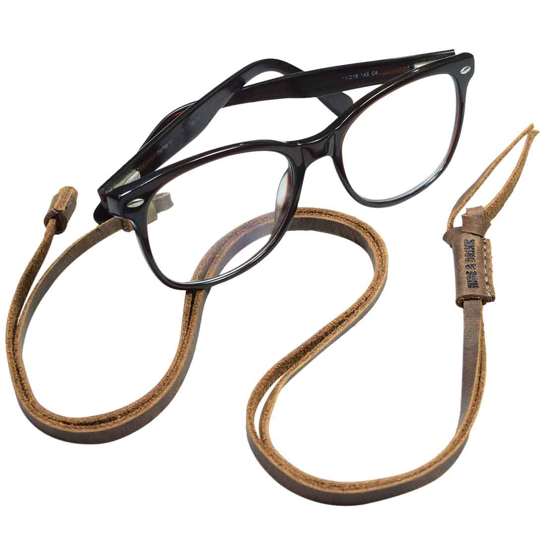 Stylish glasses with a leather glasses strap from Hide & Drink, featuring an Adjustable Eyeglasses Strap design made from Full Grain Leather. An ideal accessory for everyday use, this Handmade Glasses Strap showcases artisan craftsmanship with small batch production from La Antigua Guatemala & Oaxaca Mexico.