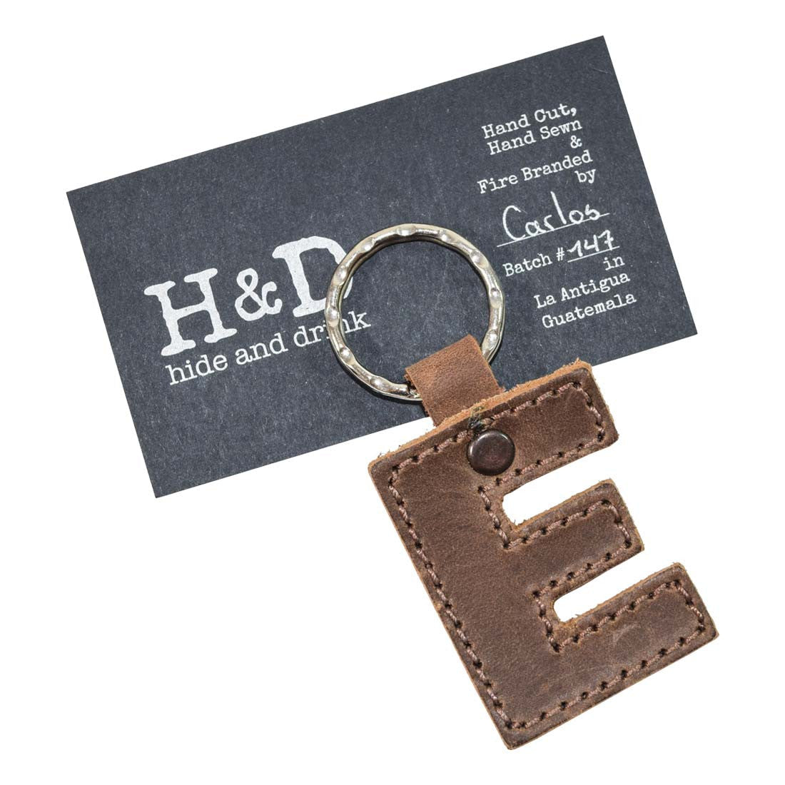 Beautiful 'F' thick leather Alphabet Letter Keychain by Hide & Drink, showcasing artisan craftsmanship. Perfectly designed for durability and style, handmade in La Antigua Guatemala.