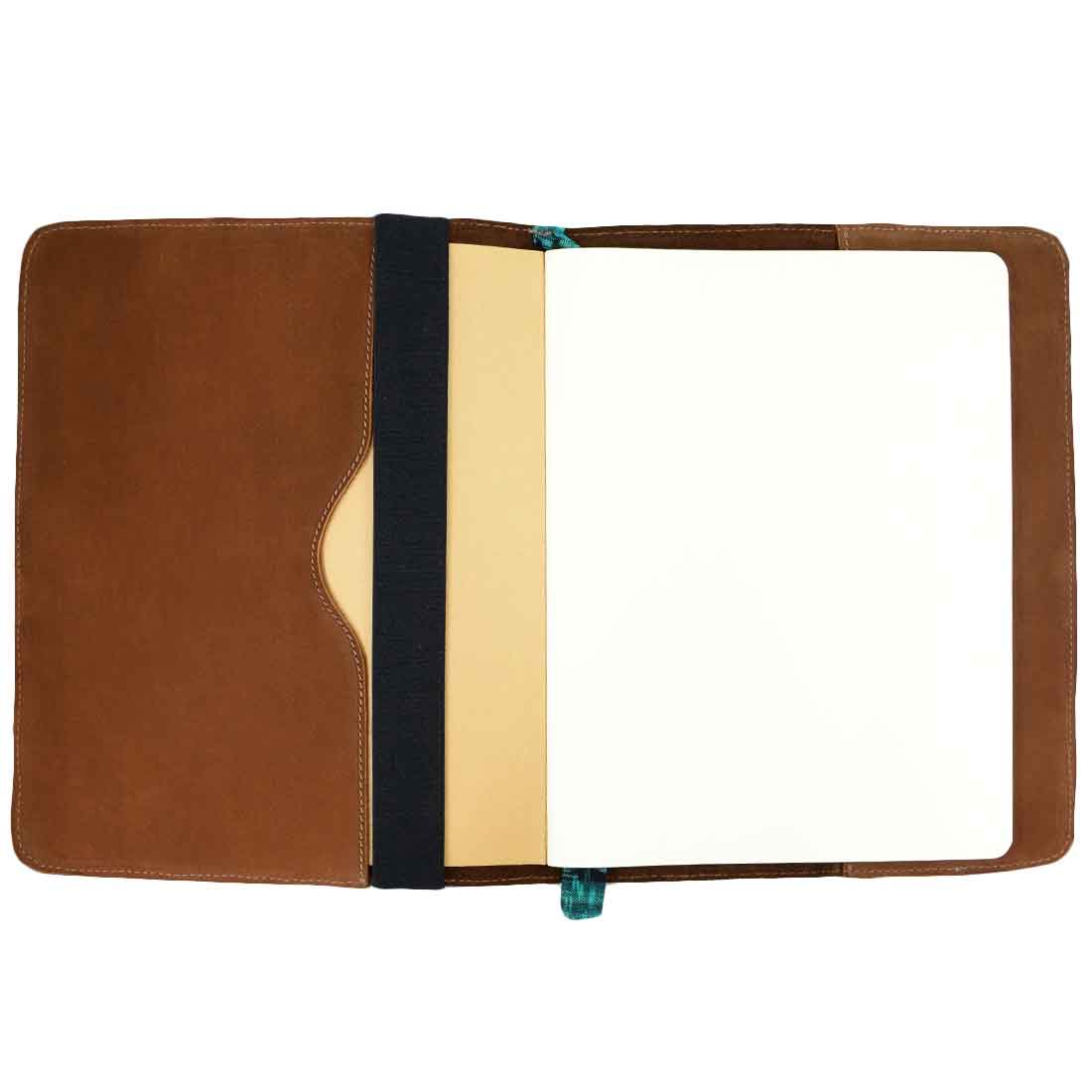 Inside view of Hide & Drink Pen Holster, showing its design for notebooks and elastic band connection, crafted from full grain leather. Handmade in La Antigua Guatemala & Oaxaca Mexico, this artisan pen case is perfect for on-the-go.