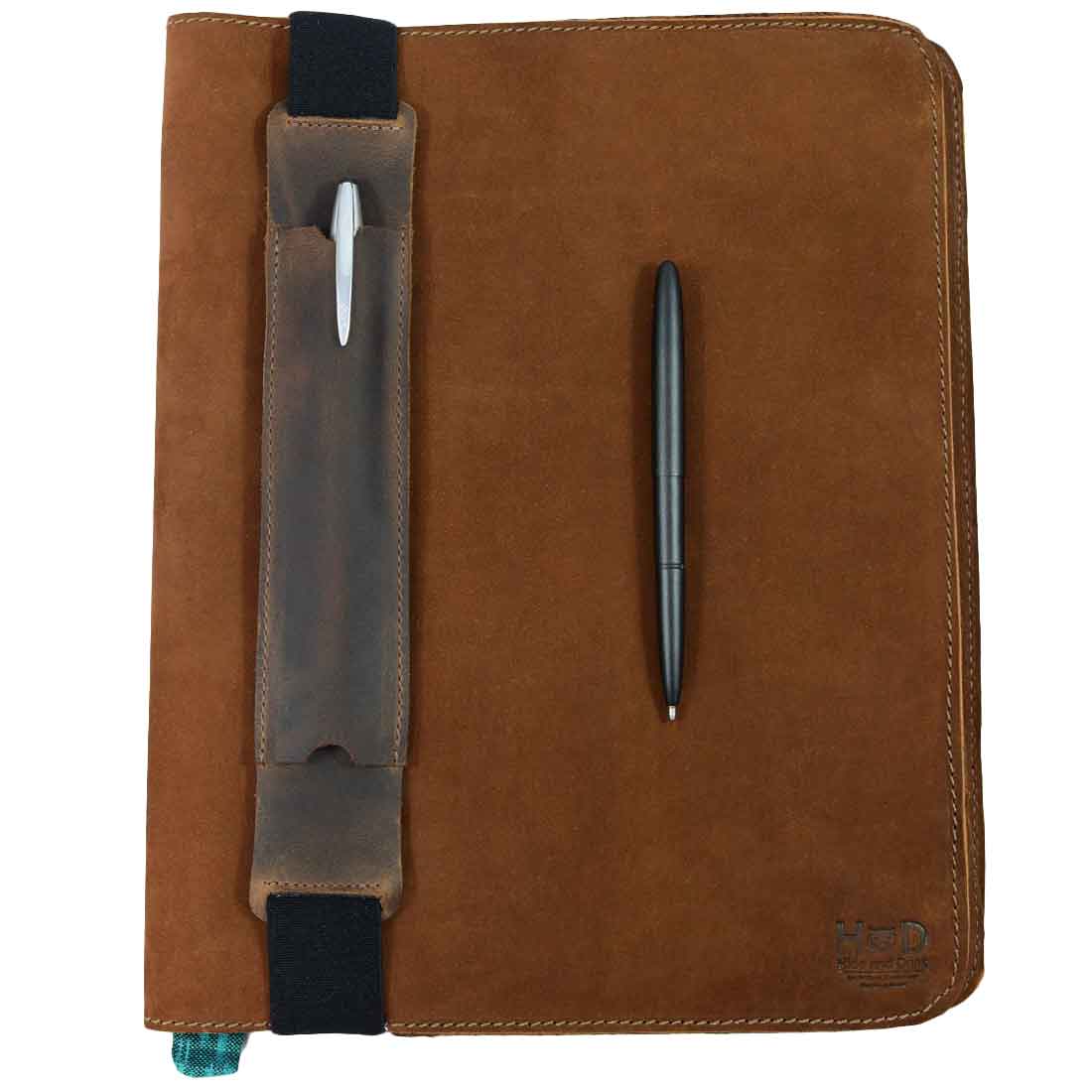 Hide & Drink Pen Holster in rich brown leather, featuring a secure pen sleeve. This stylish pen pouch, designed for 6 to 7 inch notebooks, is handmade by artisans in La Antigua Guatemala & Oaxaca Mexico.