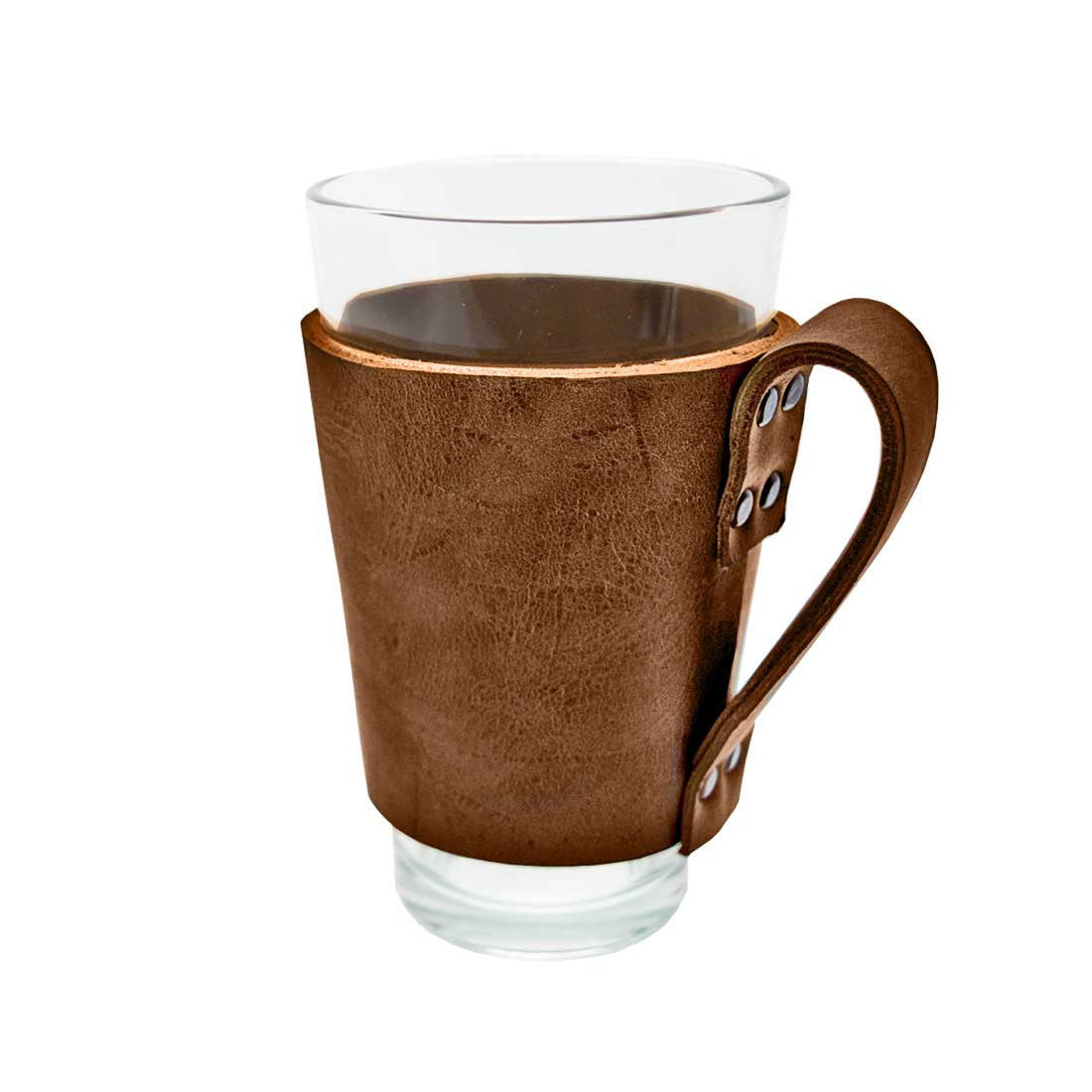 Showcasing the Pint Sleeve with Handle by Hide & Drink, this artisan piece made from Full Grain Leather combines both style and function, ideal for bars or pubs. Hand Cut, Hand Sewn, and Fire Branded, it's handmade in La Antigua Guatemala & Oaxaca Mexico, perfect for keeping drinks cold.
