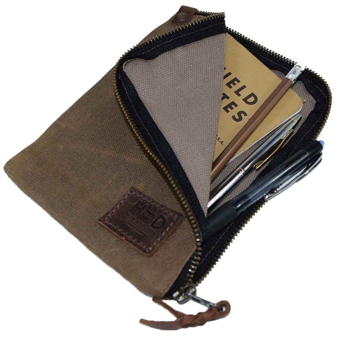 Brown Scribbler Case from Hide & Drink, featuring Waxed Canvas. Designed for notebooks and showcasing small batch production, hand cut, hand sewn, and artisan quality. Handmade in La Antigua Guatemala & Oaxaca Mexico.
