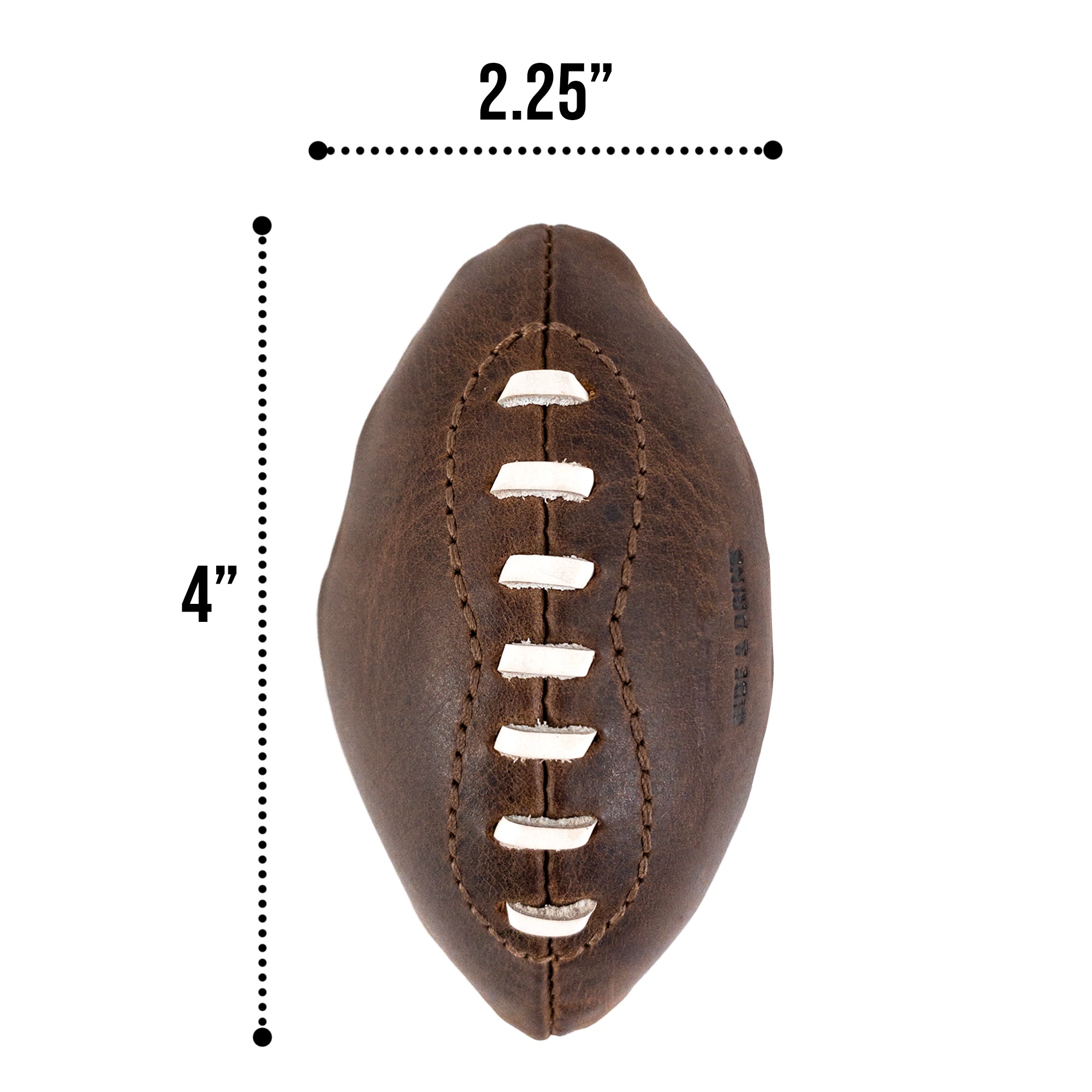 A Mini American Football by Hide & Drink, displayed with its measuring dimensions. Crafted with care from full grain leather, this hand cut ball is part of an artisan collection, ideal for decoration, keepsake, or sports memorabilia.