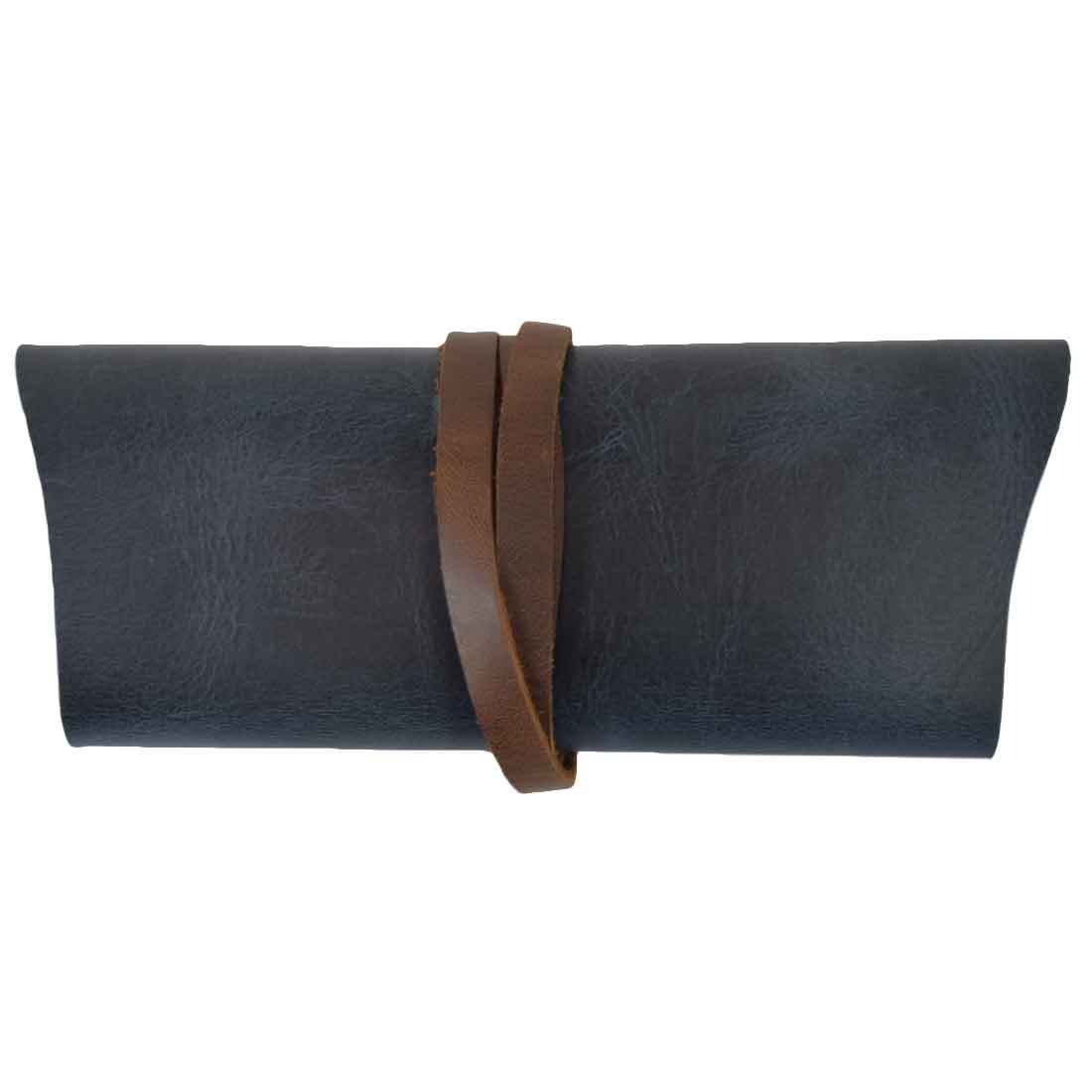 Hide & Drink Sunglass Wrap features a chic leather design that safely stores sunglasses. This eye glasses storage solution, made with full grain leather, is ideal for travel and reflects the artistry of small batch production.